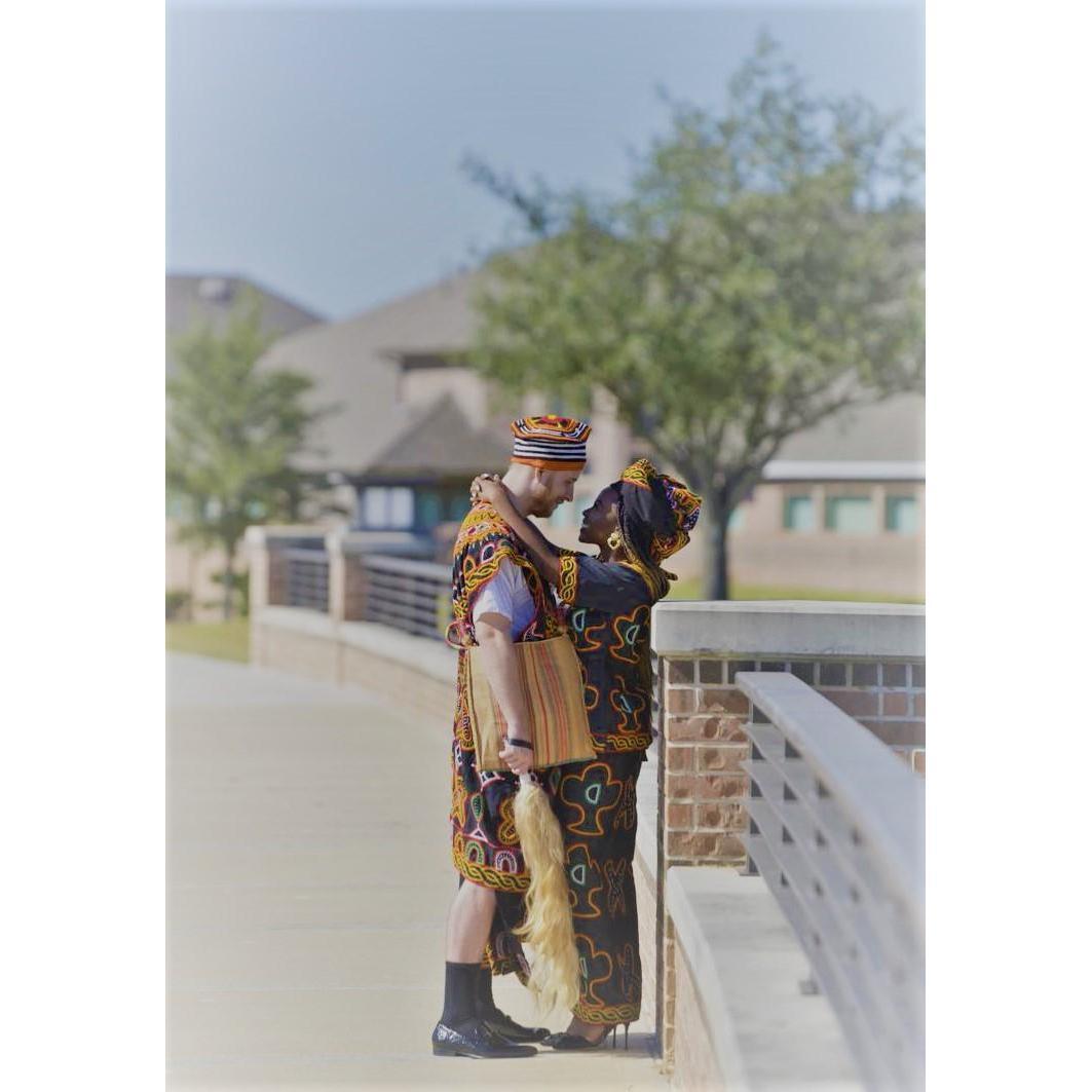 Brett having a blast in traditional attire - melts my heart.
