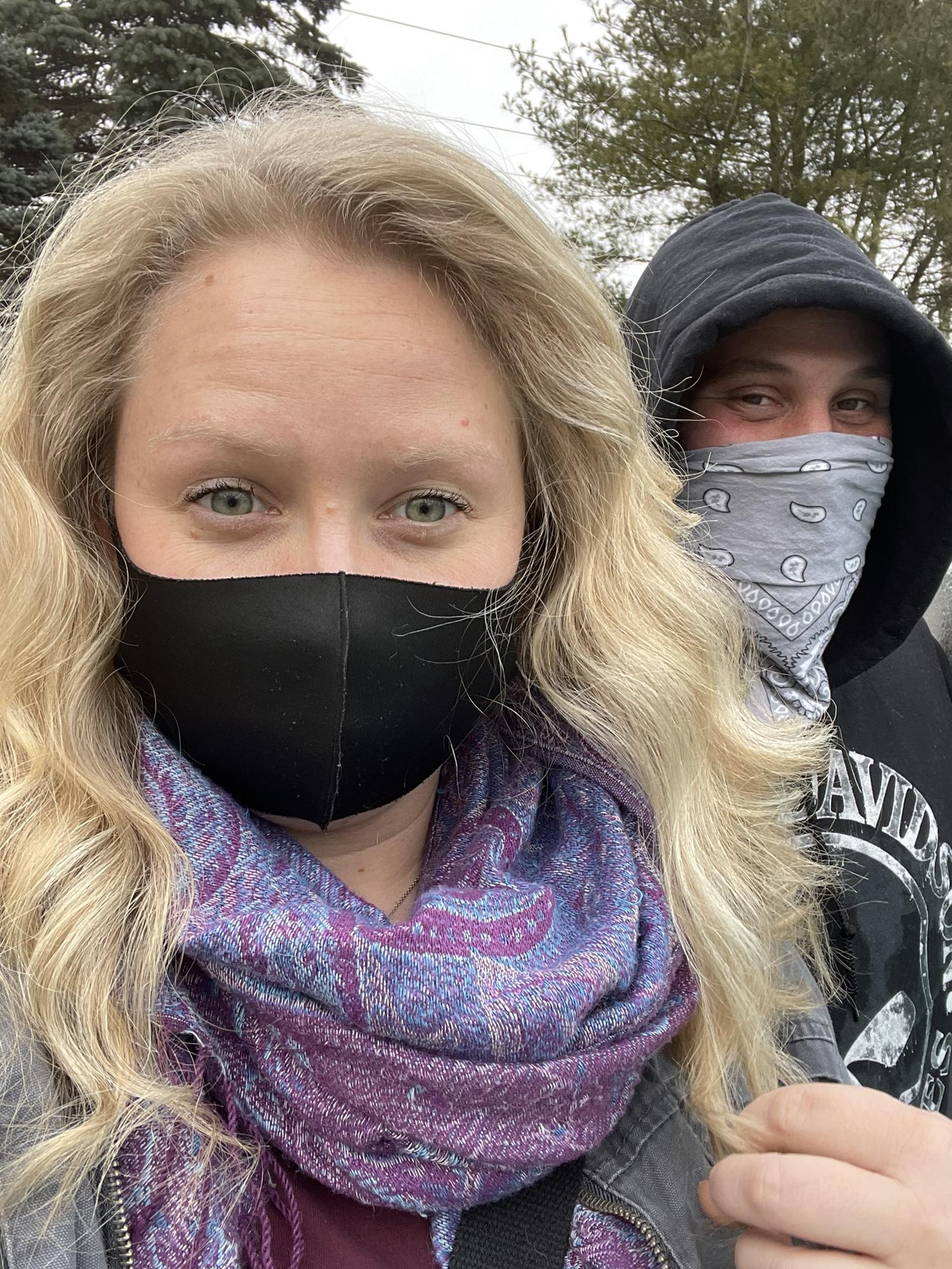 Again.... Kenny putting up with Bre's selfies. January 2021... the adults take a day to check out Mystic Aquarium.