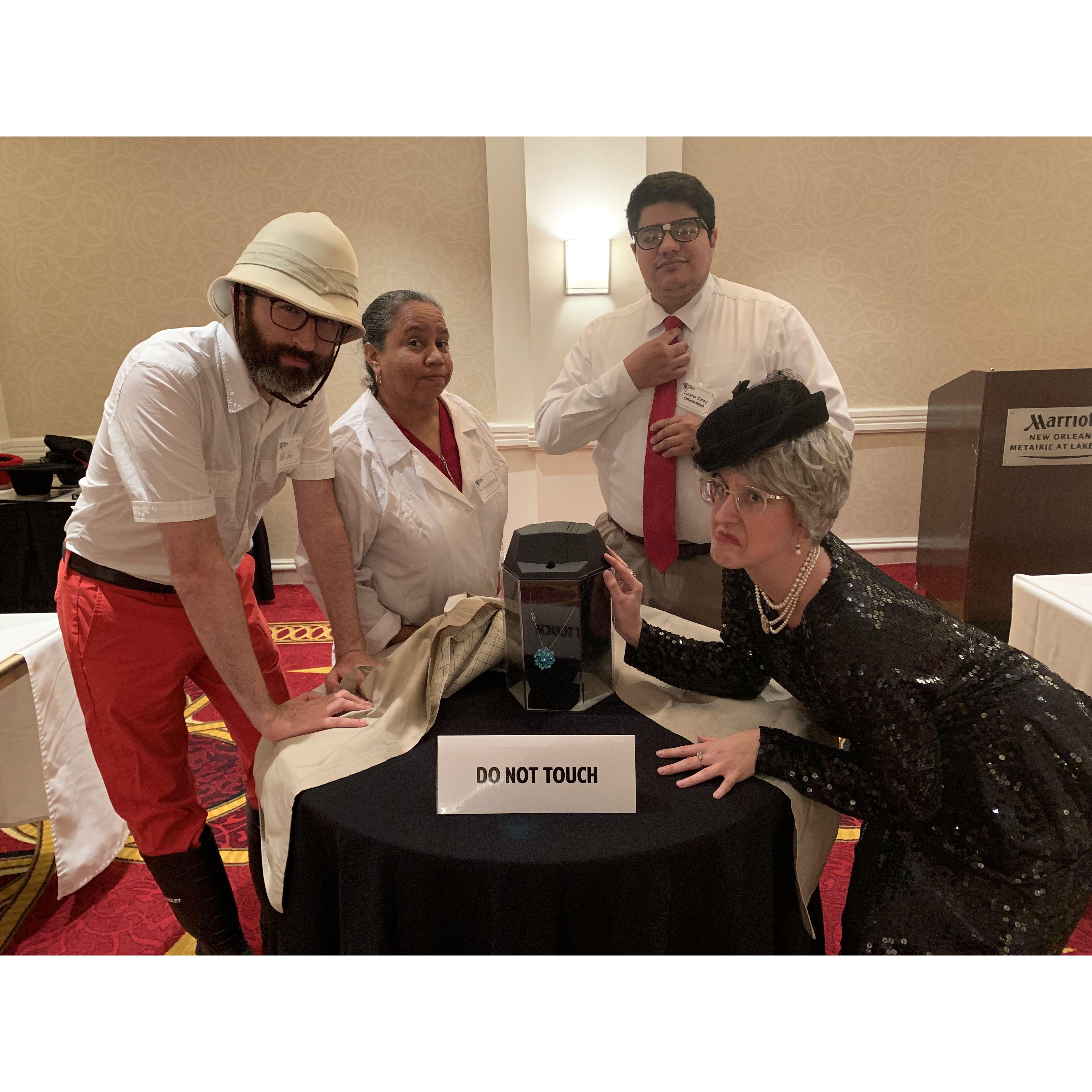 The first time Brian and Erika met, they were working for the Murder Mystery Company- and Erika was playing an old lady!