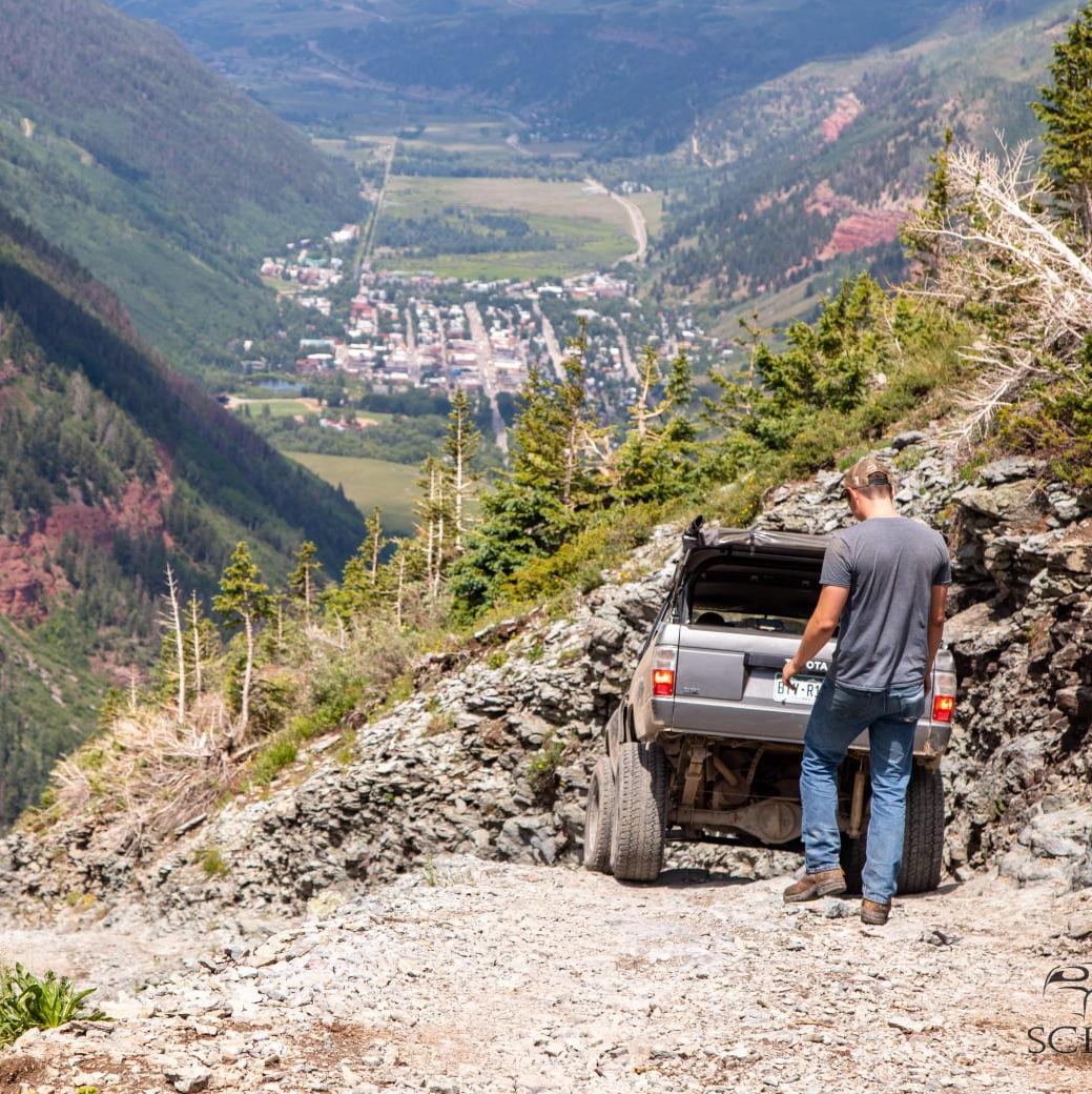 This photo is on the very same trail, facing the other direction. Cassie is in the vehicle in front of James.
