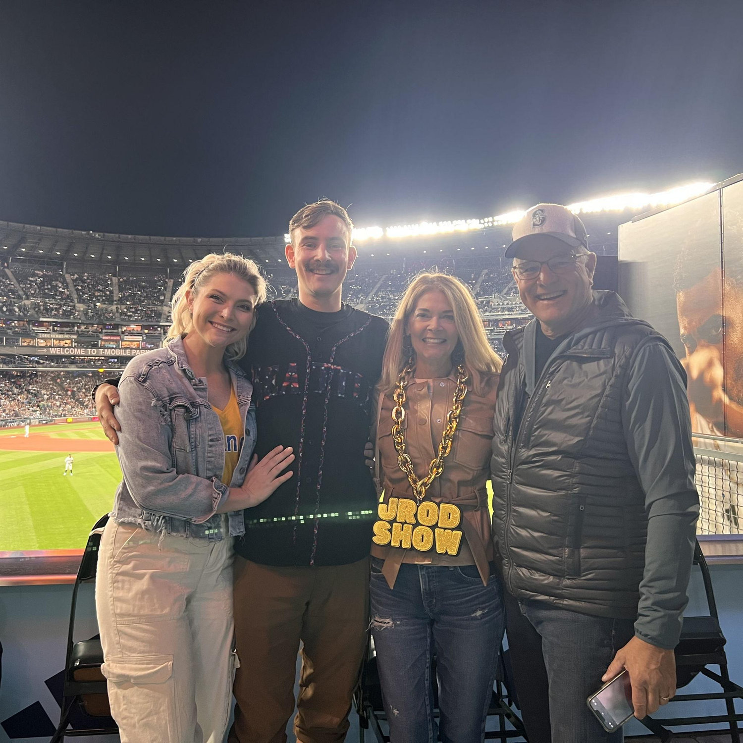 The first time Megan met Dane's parents was at a Mariners game!