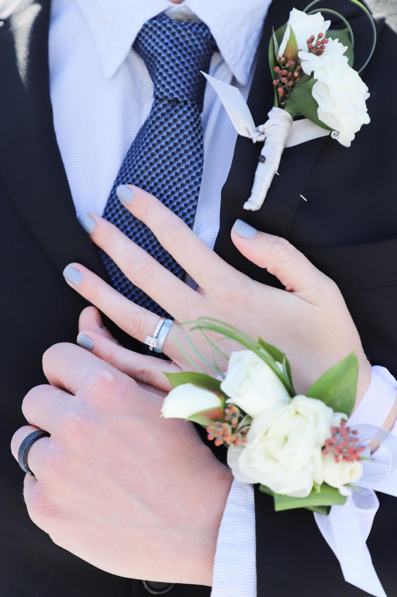 Another photo from our elopement photoshoot, showing off our new silicon wedding bands - a promise that one day we’d have a bigger celebration with metal rings.

Picture by: Allison Davis