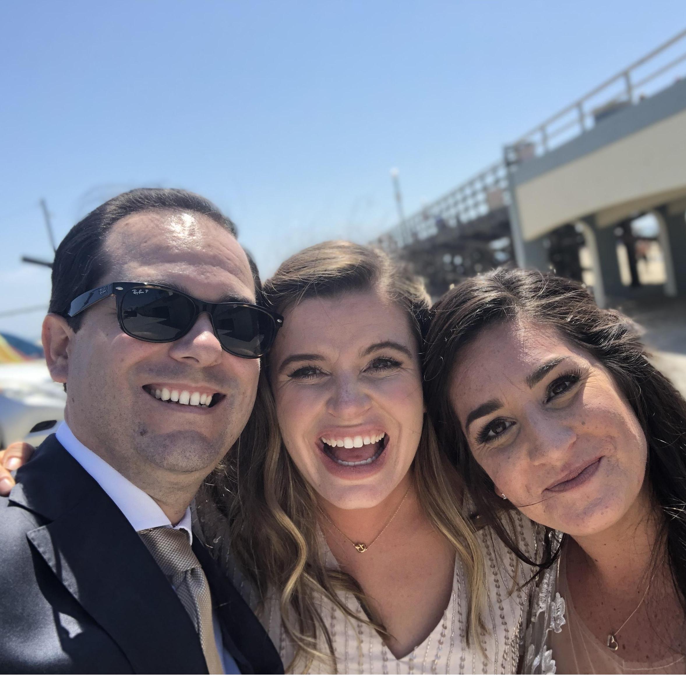 Taking photos at Seal Beach on Kelsey's wedding day