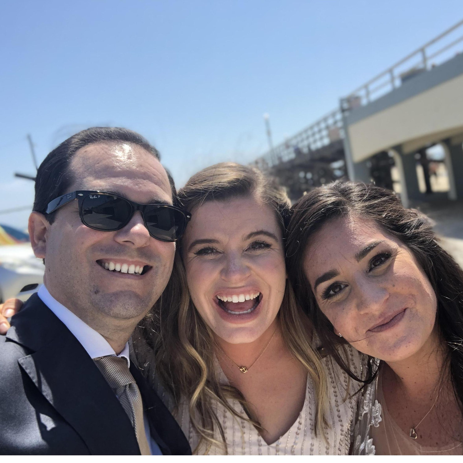 Taking photos at Seal Beach on Kelsey's wedding day