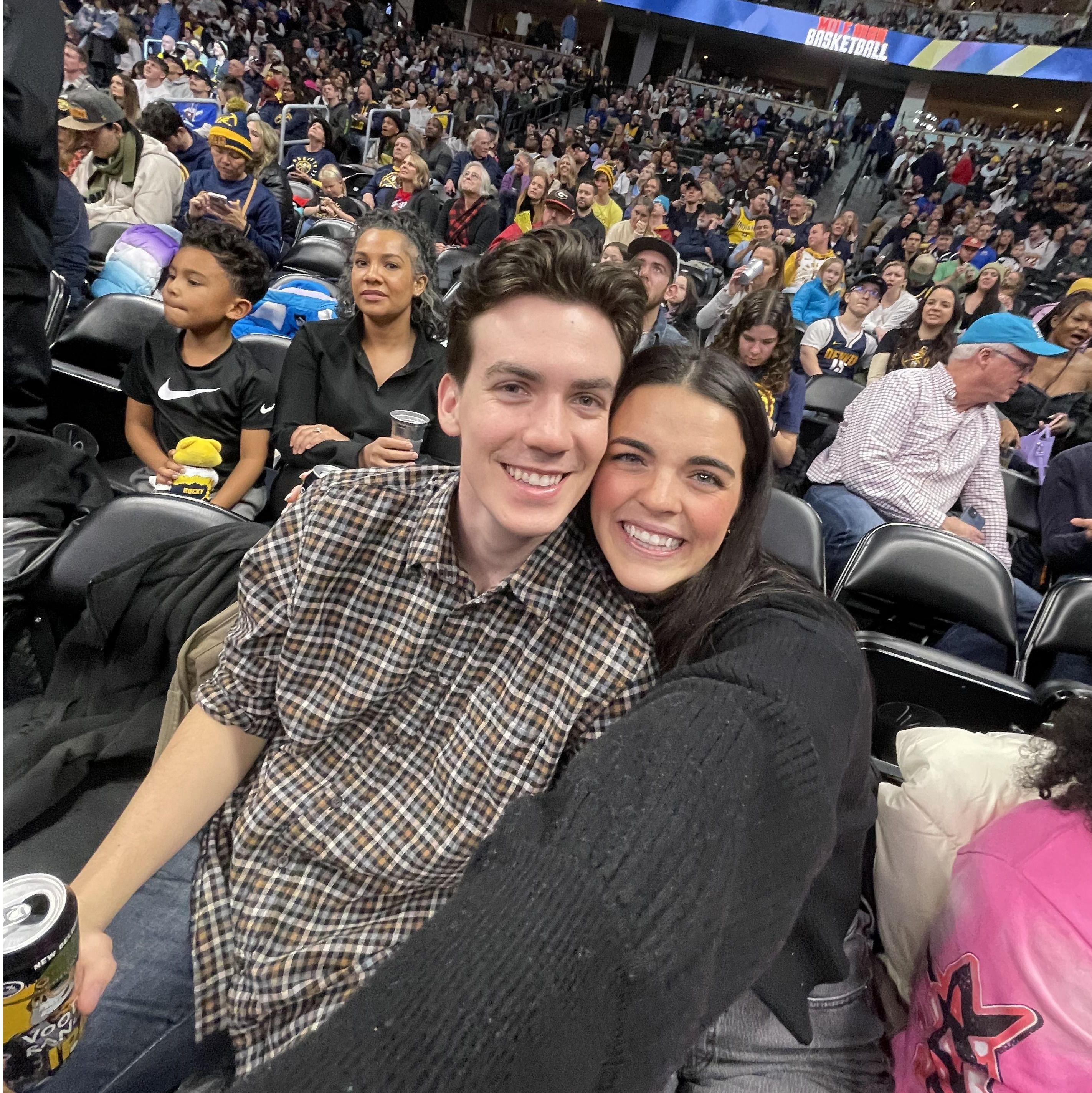 Abby and Alec celebrate engagement with a Nuggets game! This was a callback to Alec's first visit to see Abby in Colorado a year prior.