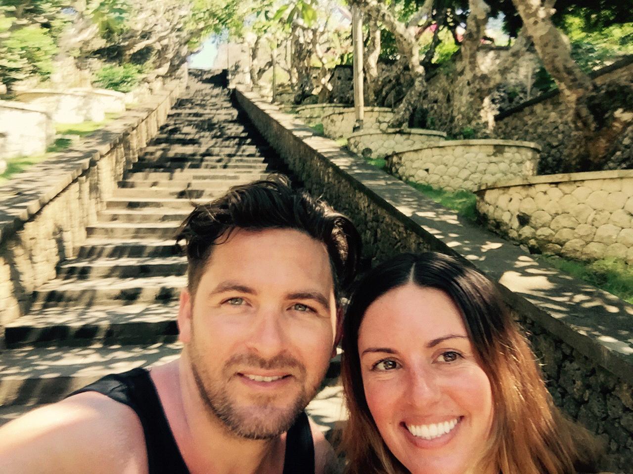 taking a quick break at the temple steps after an angry monkey stole my sandal.