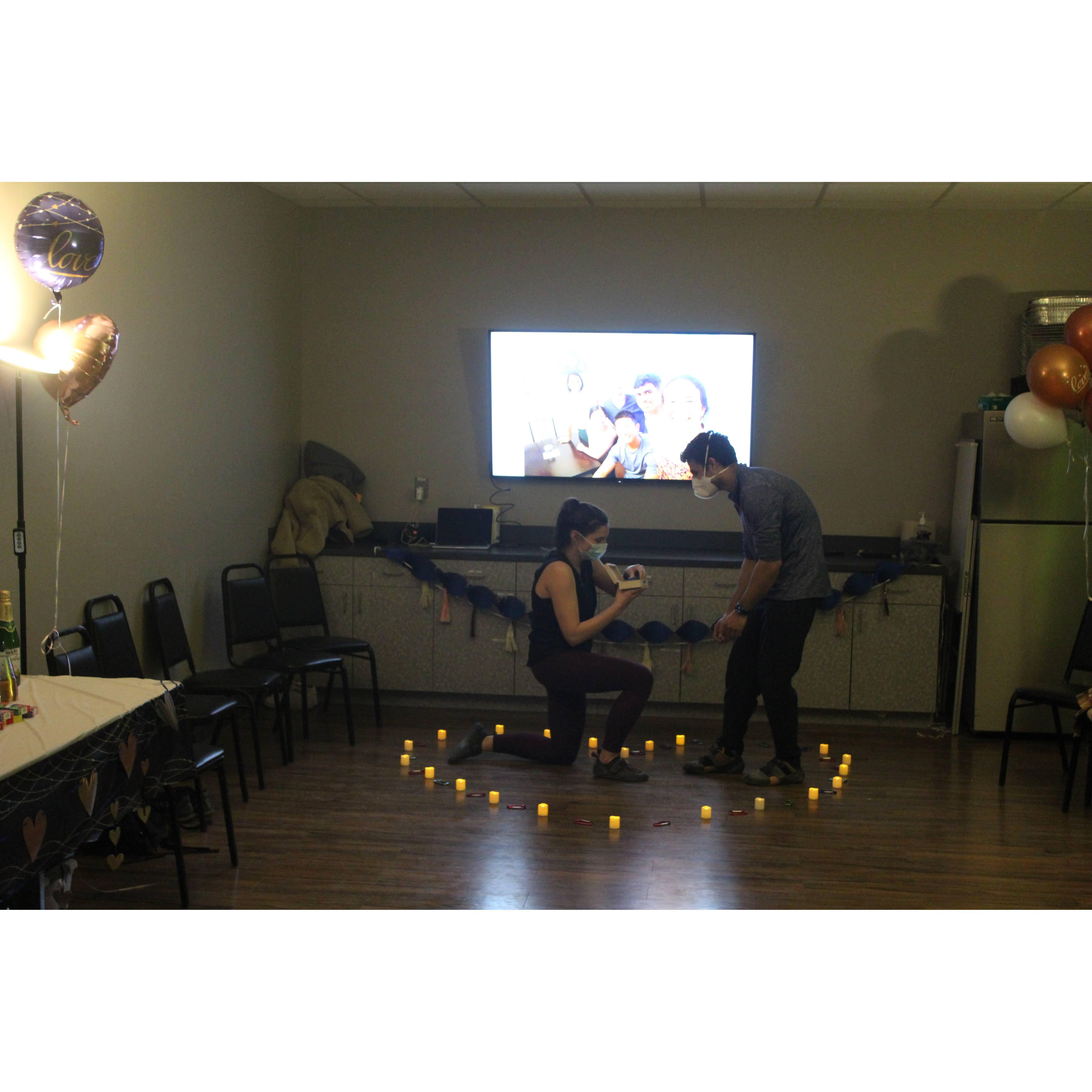 Rebecca proposed back to Bijan on February 26th 2022 at the Triangle Rock Club Climbing Gym