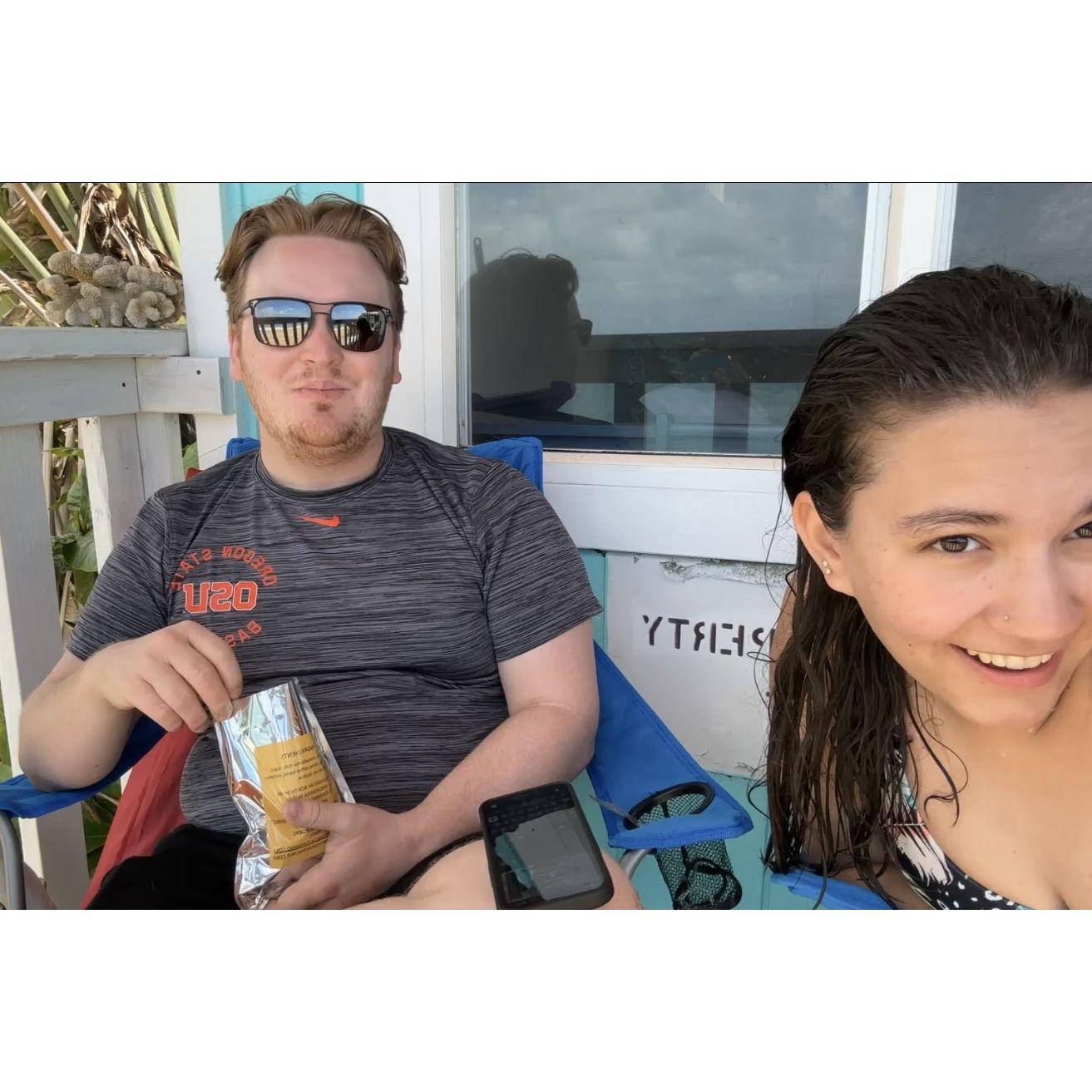 Our first adventure as a newly engaged couple: sun bathing after a swim in Hauula, HI