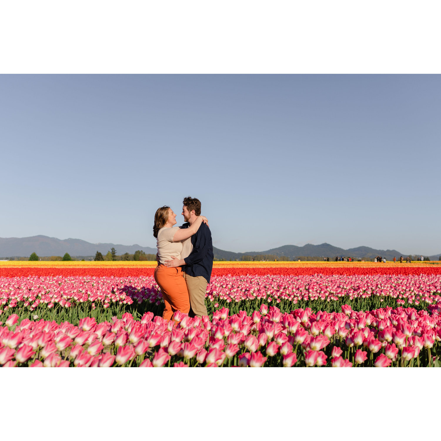 Our engagement photos taken by the incredible Caylie Mash at Roozengaarde in Mount Vernon, WA for the tulip festival, one of our favorite events each year. April 2025