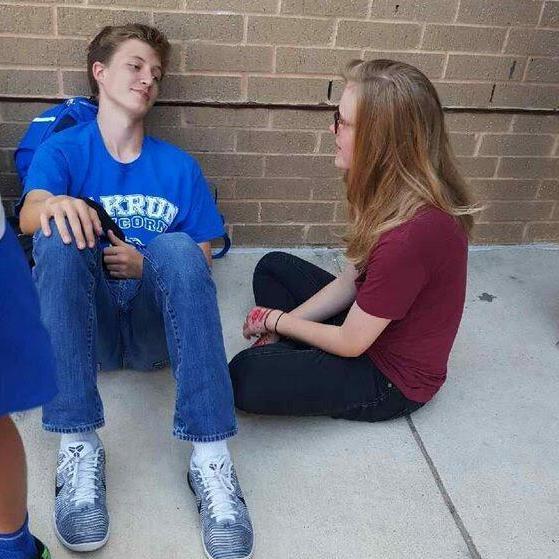 Waiting for our moms in the middle school pick-up line. This was our first picture together, a week after we became "official". (2016)