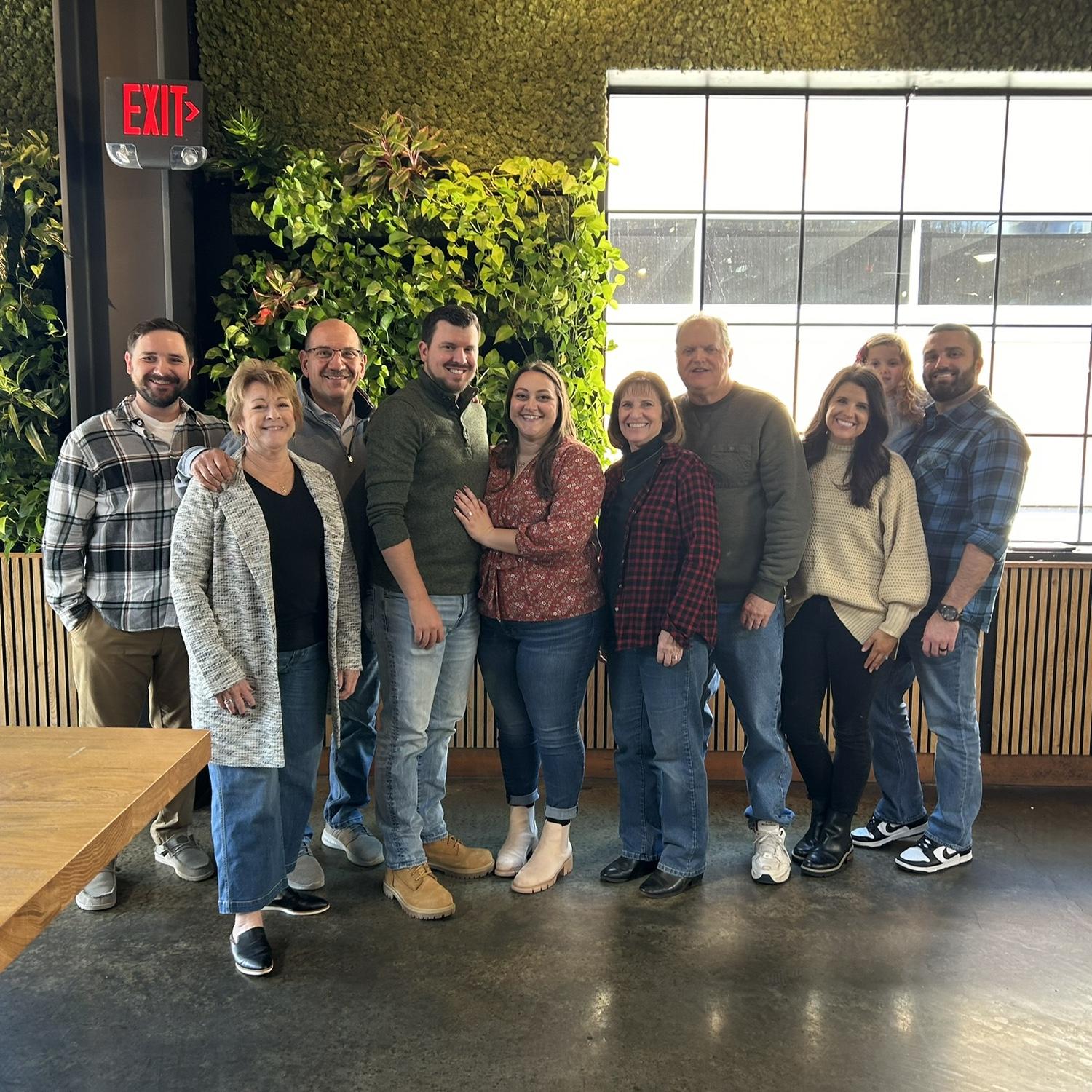 Both of our families after Brad proposed!