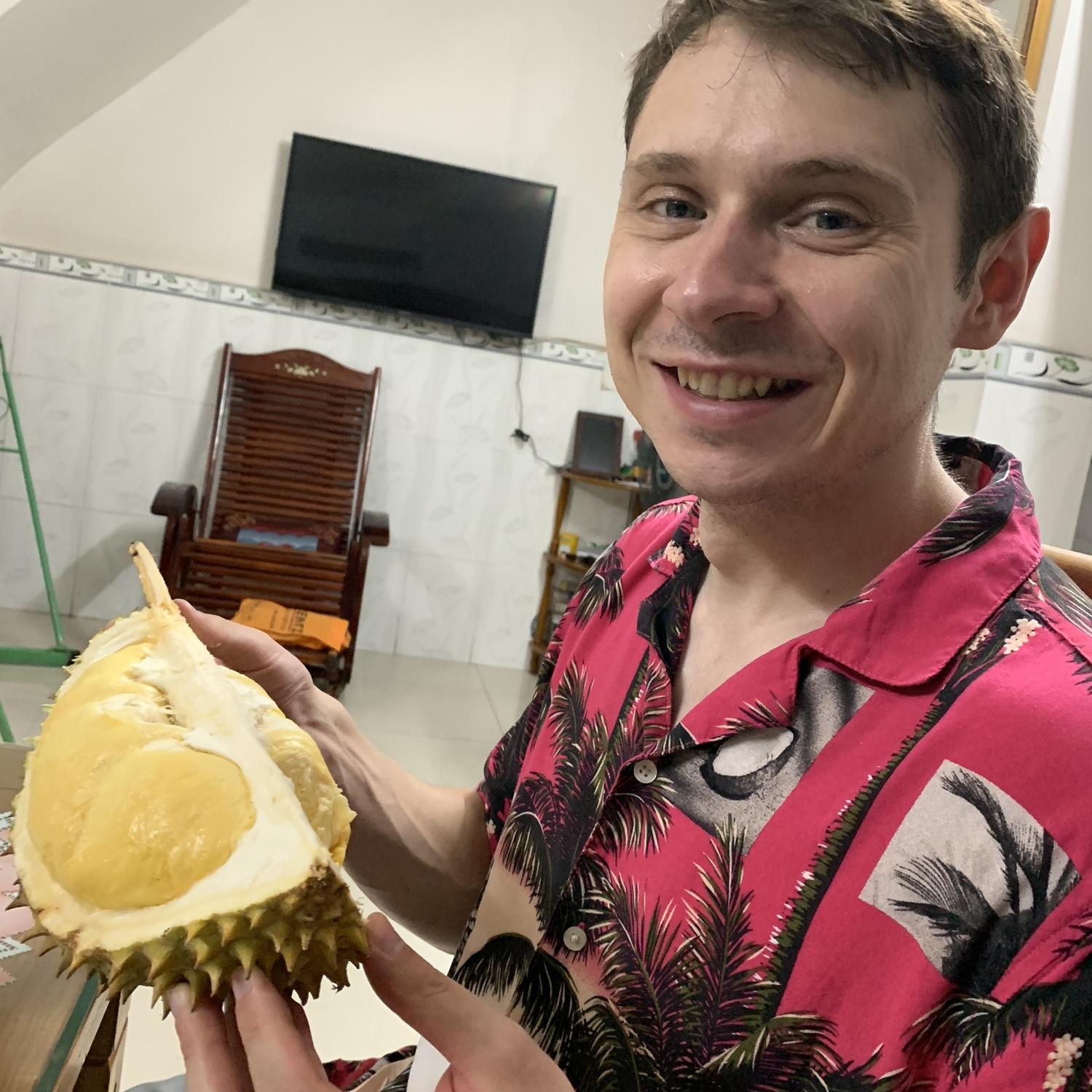 Isaiah trying An’s favorite fruit for the first time
