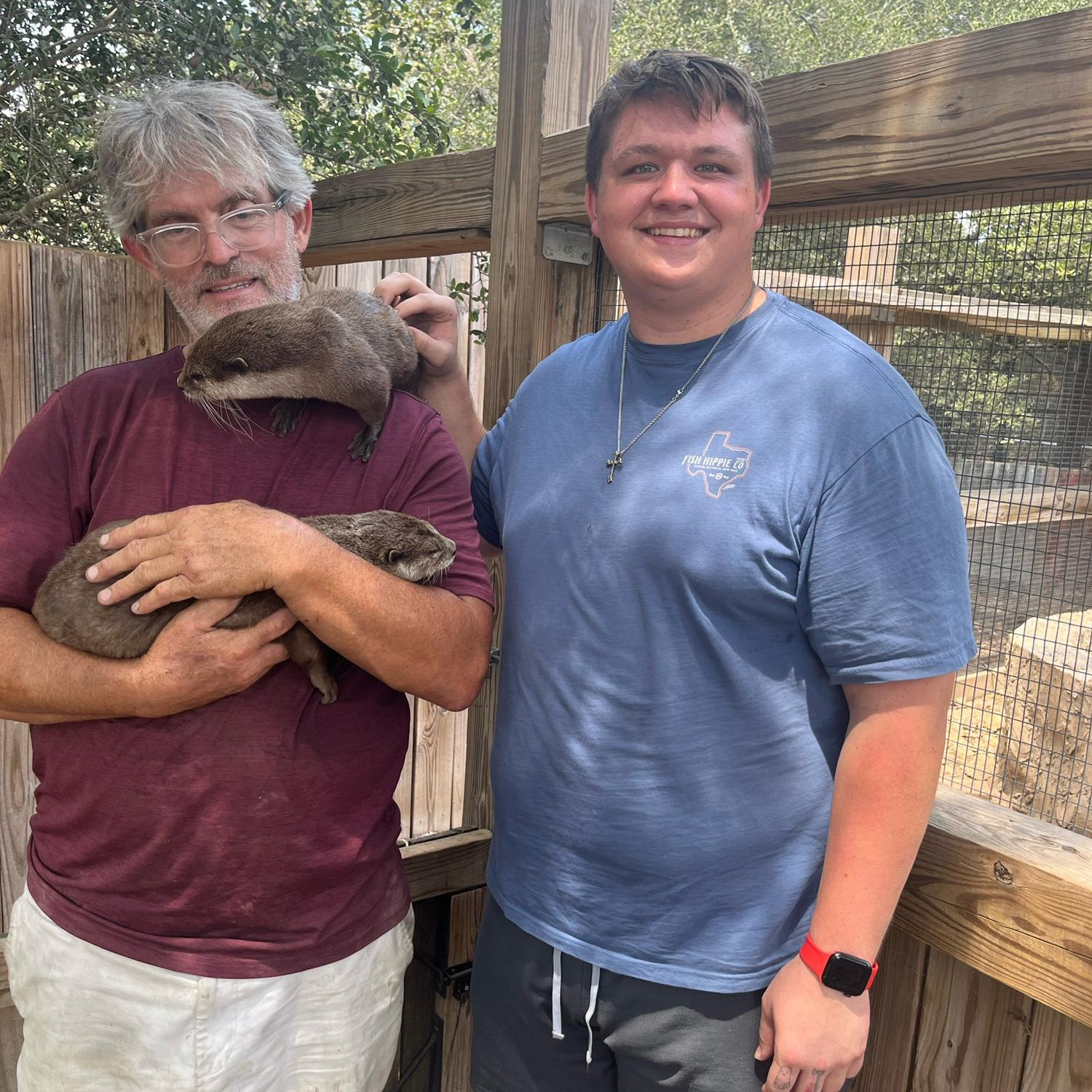 Fun petting the otters!!! (Walker favorite animal) 🦦