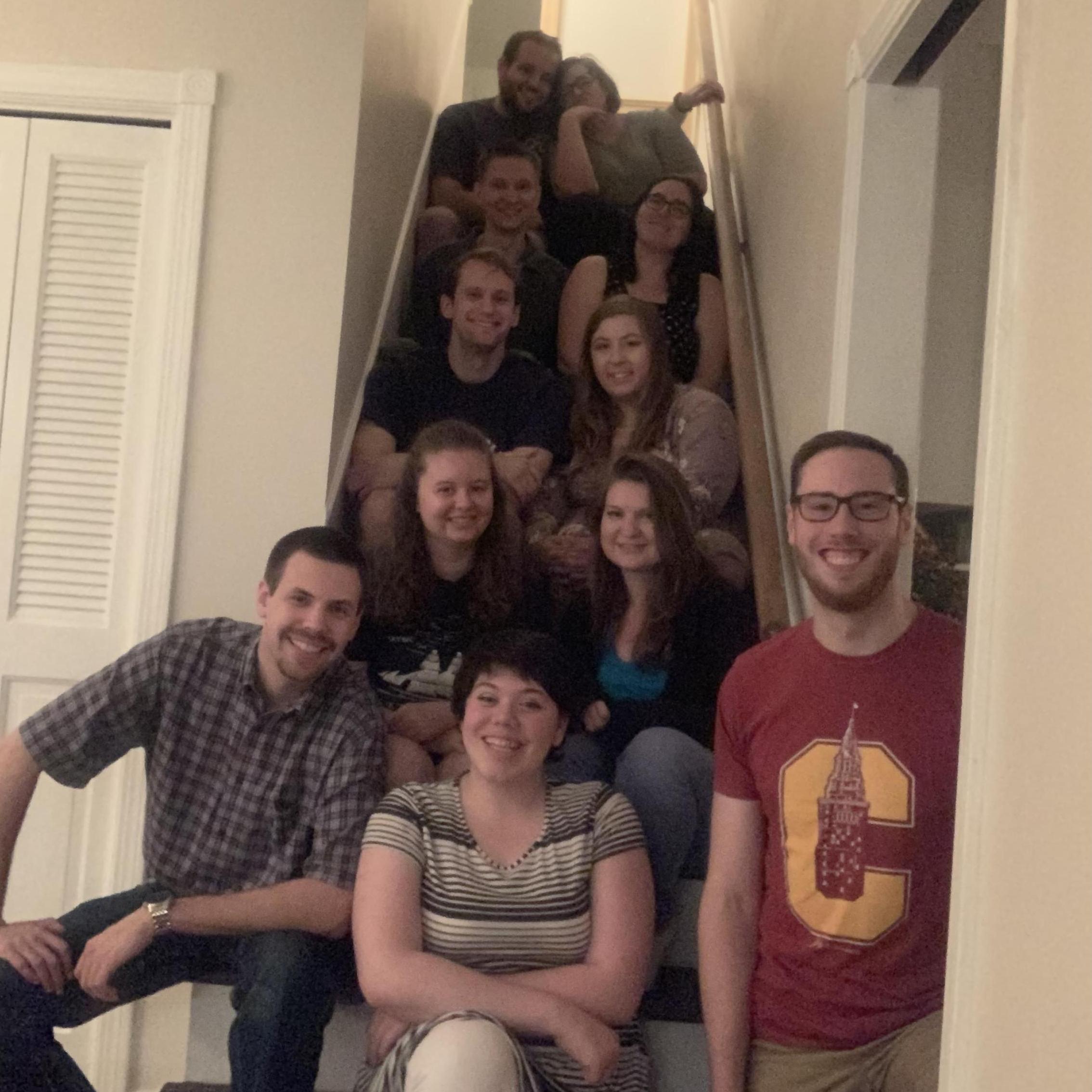 A group picture with the couple and their friends.