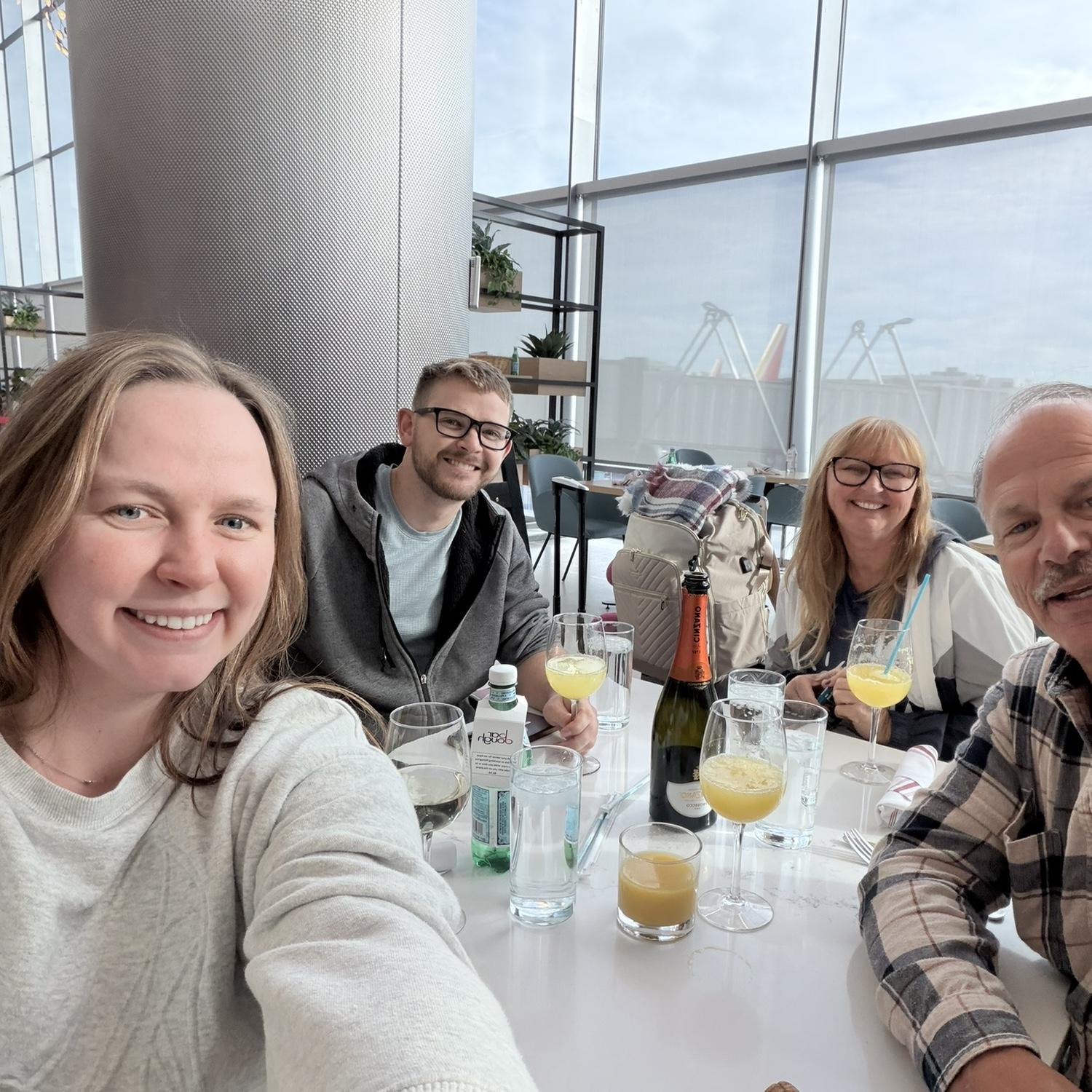 Brunch before our flight to New York—Robert was hiding the ring in his jacket pocket.