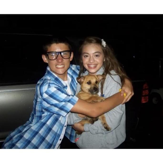 This was taken in 2010 at BPYC, I was about to take my photo with this cute stray dog and Caleb decided to photo bomb me !