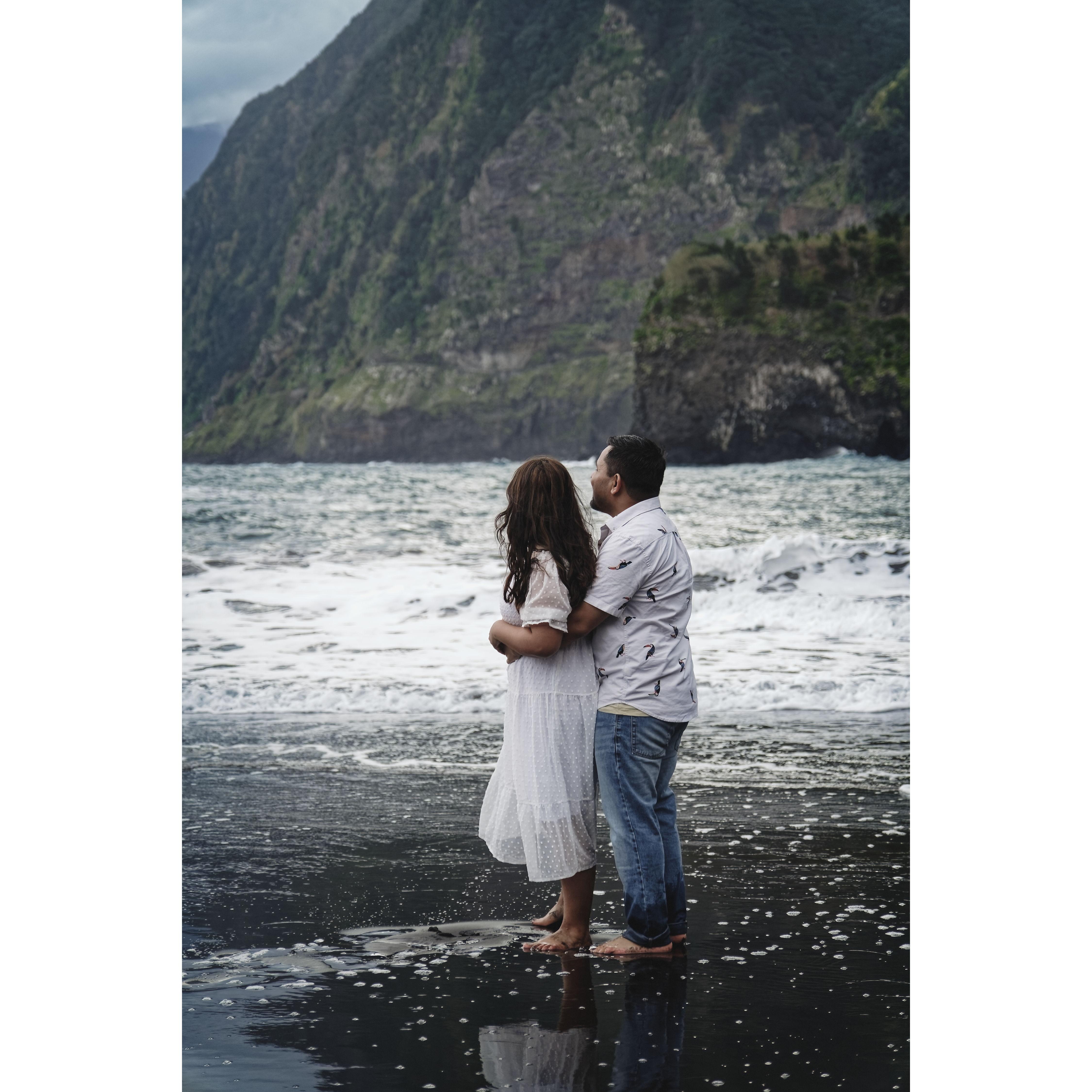 Enjoying the beautiful black sand beach in Madeira.