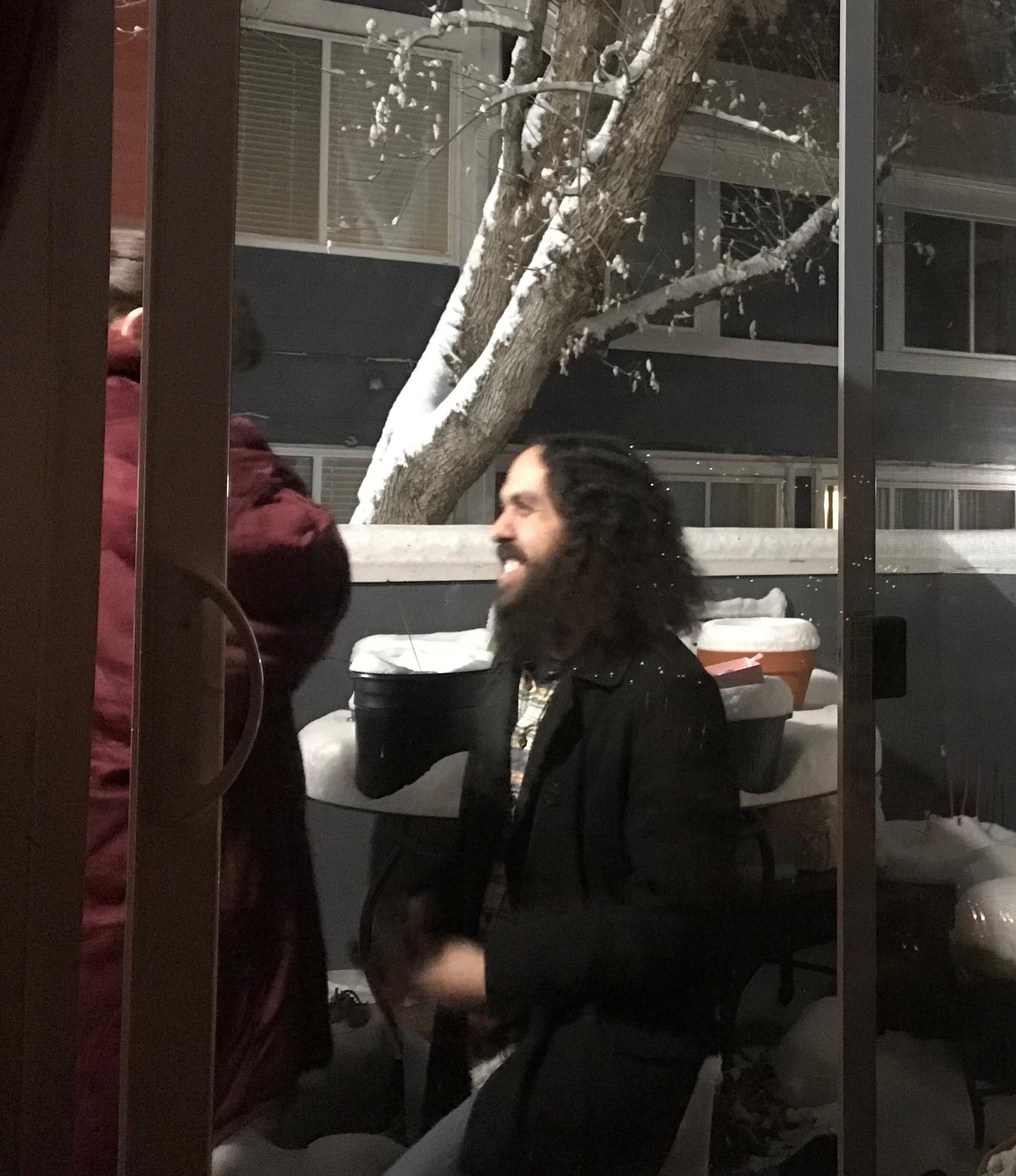 Tasha ugly crying, Morgan on one knee in the snow (and probably cold)