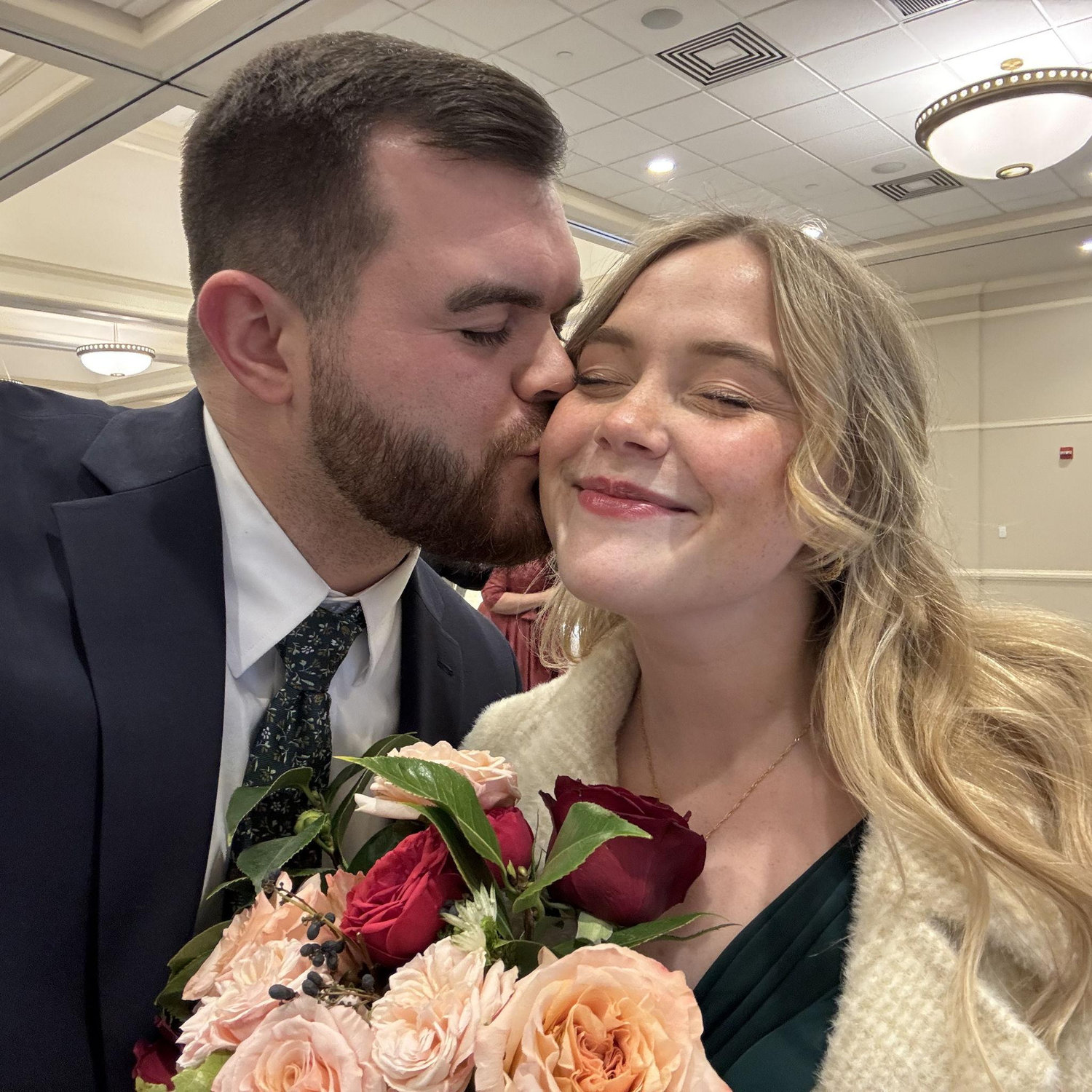 John and Emily at a wedding in January 2025
