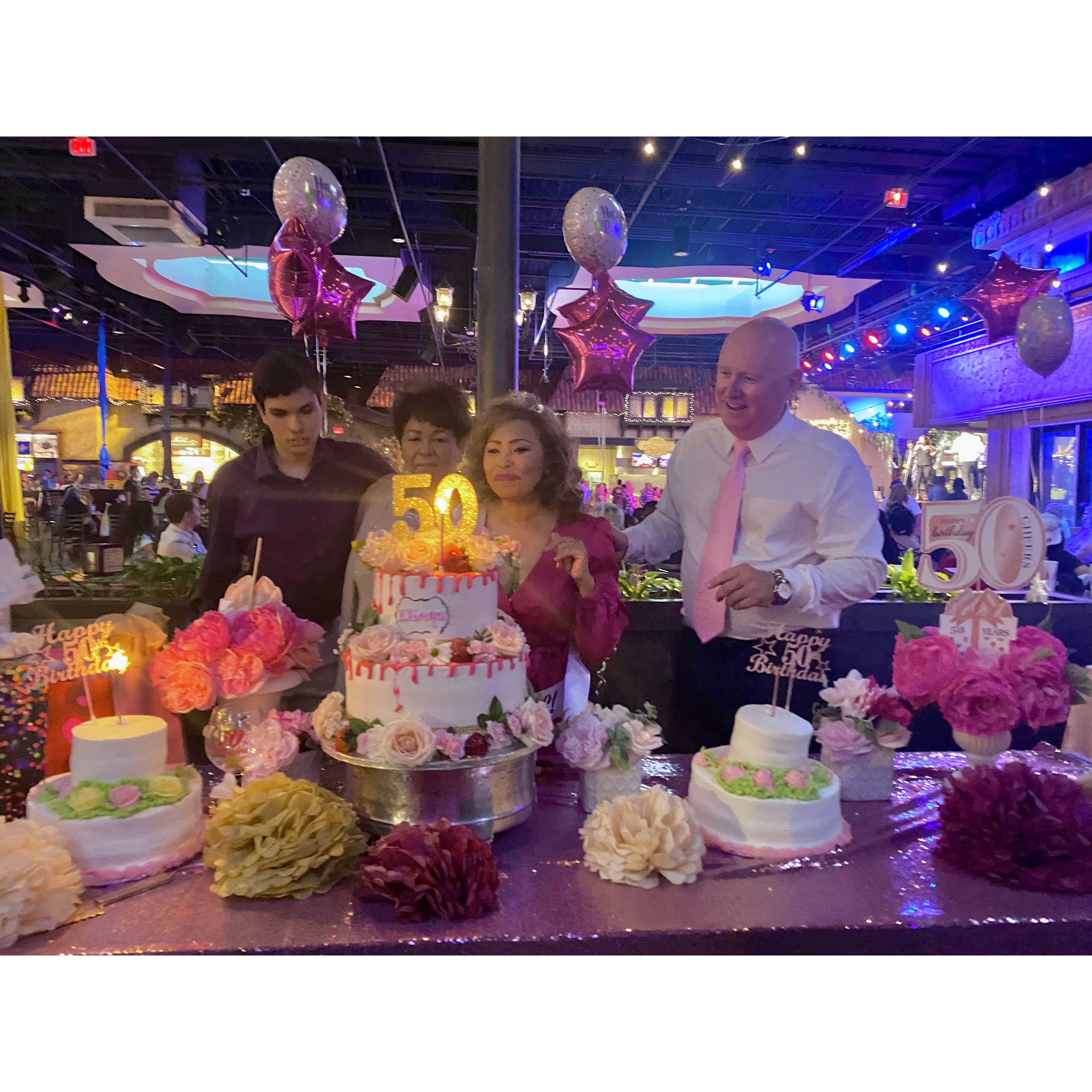 Blowing out the candles.