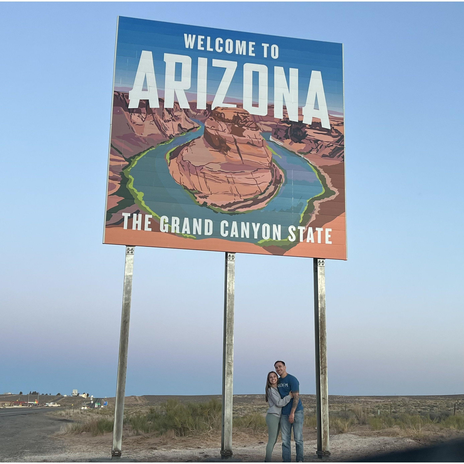 We love taking pictures in front of signs! We have a collection now. May 2022