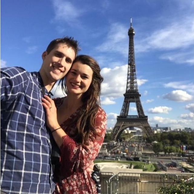 We got engaged at the top of the Eiffel tower right before this picture was taken!