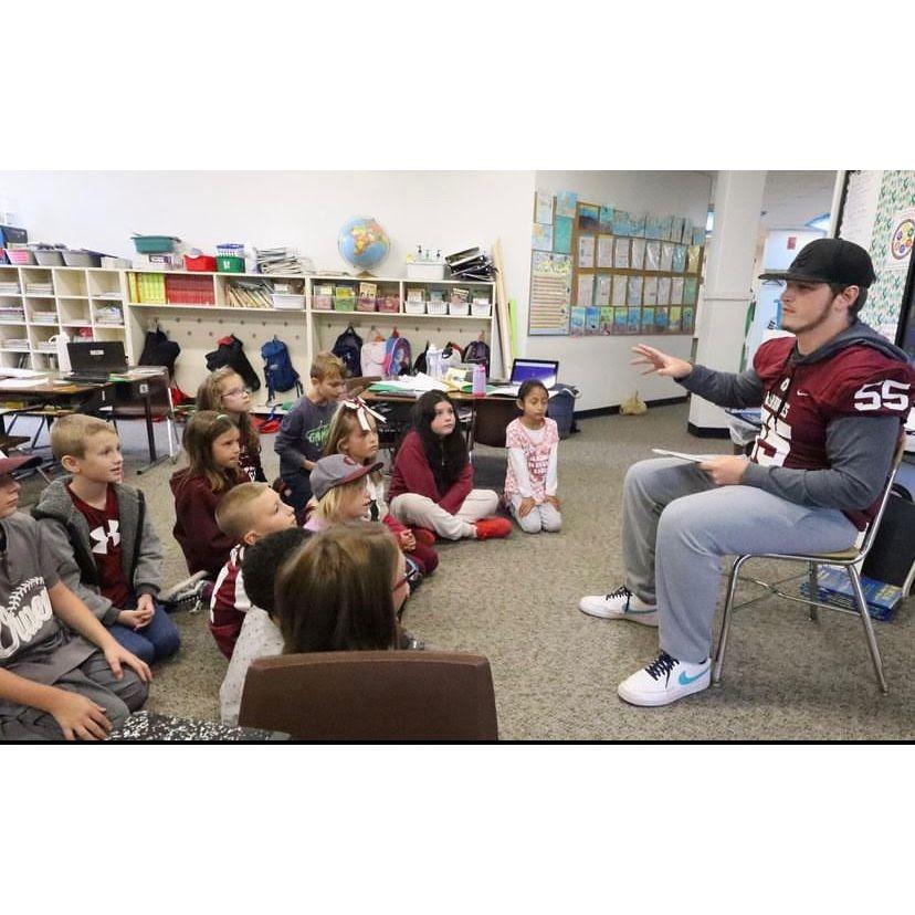 Lucian reading to the primary school kids!