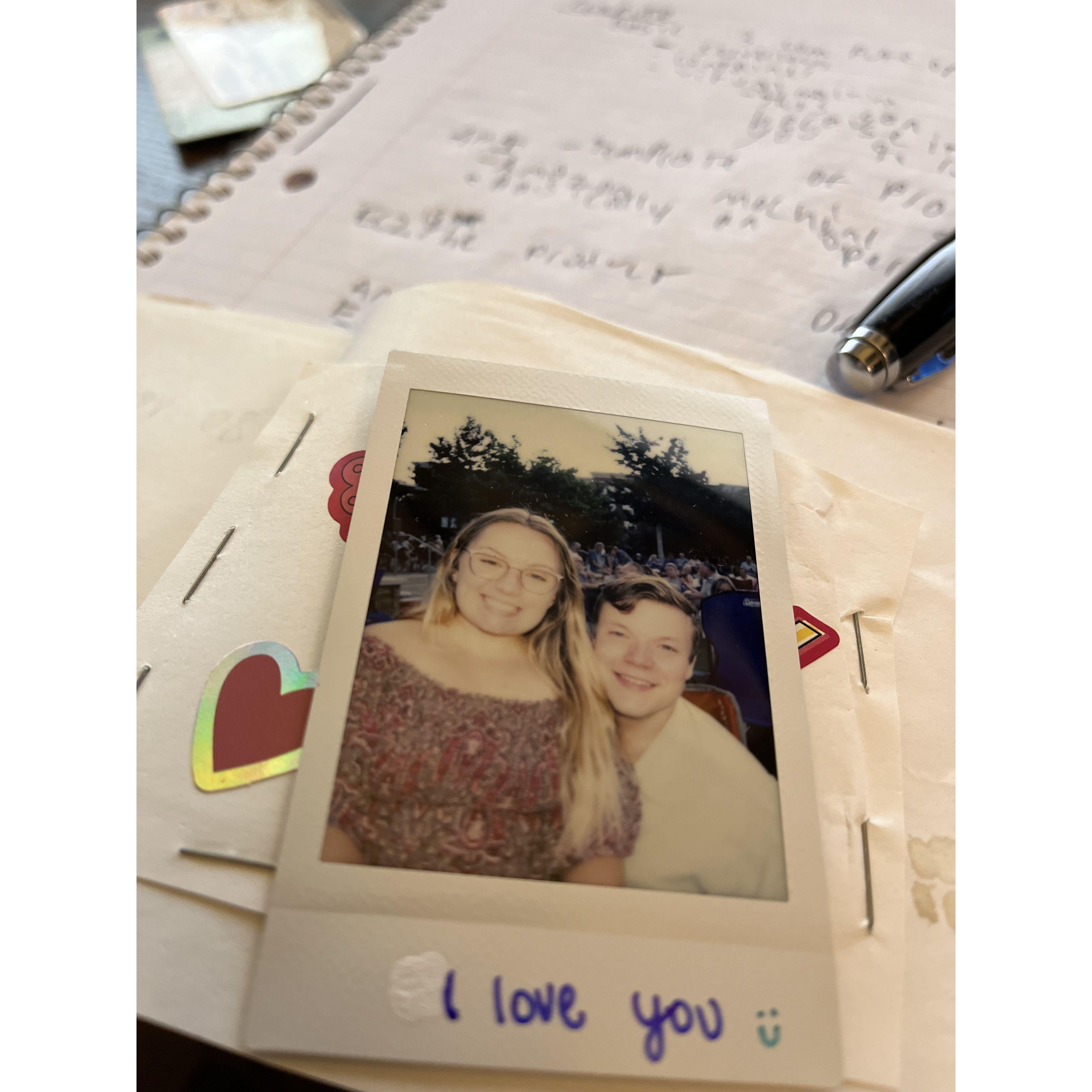 Caroline was the first to say "I love you" with a card and a polaroid