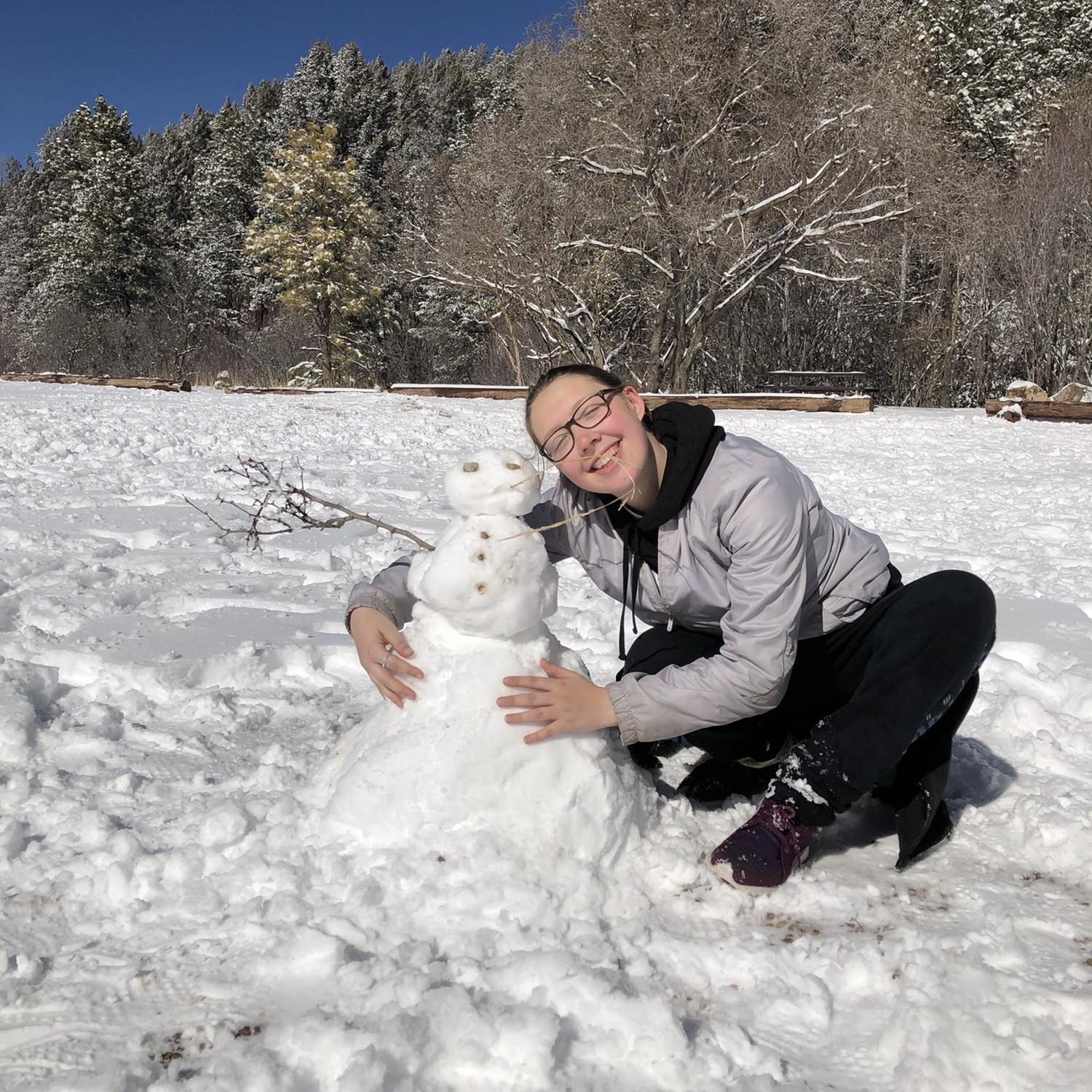 From our first trip together! We went to New Mexico during Spring Break 2022, and didn't check the weather so we were so ill prepared for snow. We made a cute little snowman though!