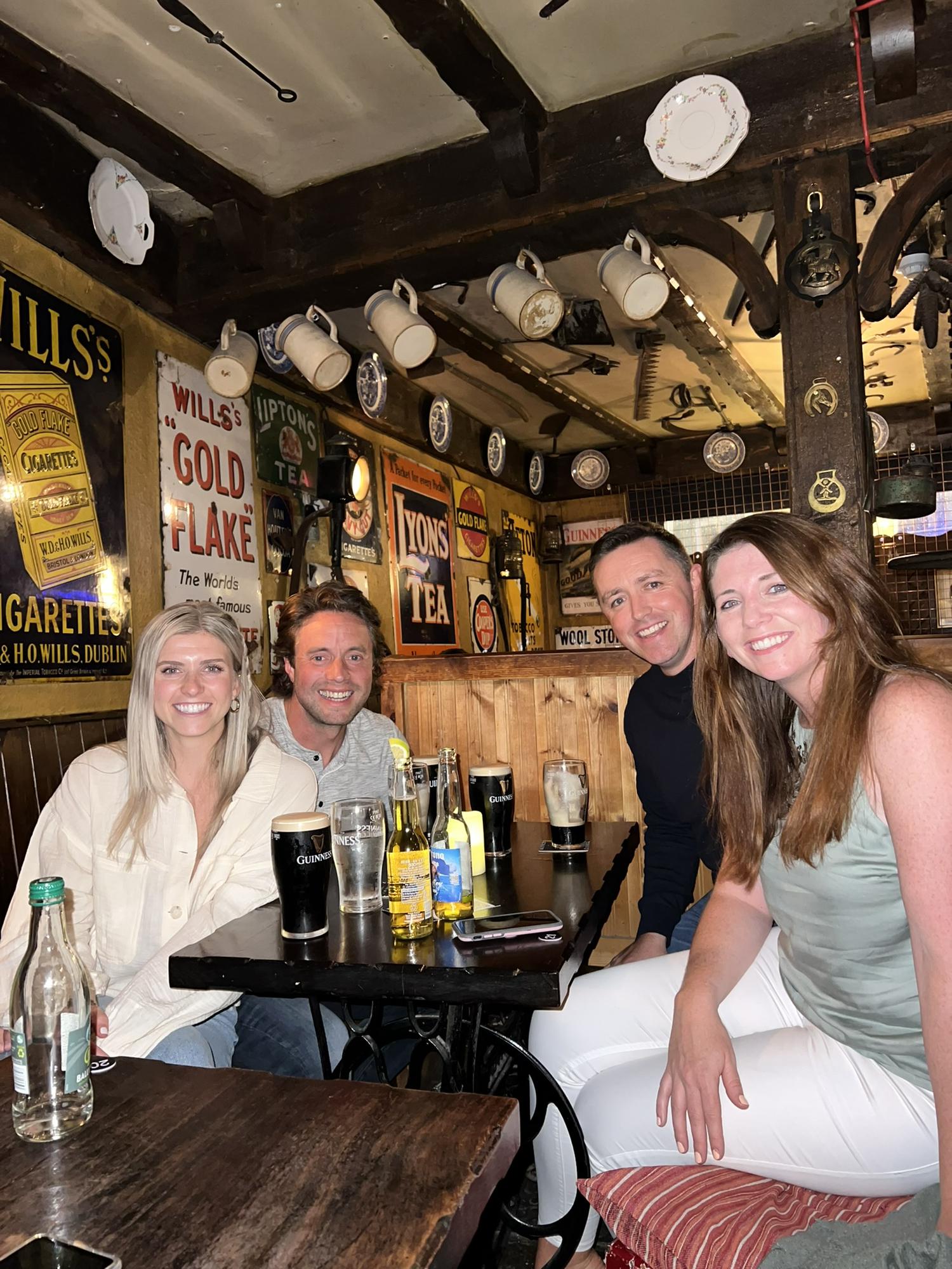 Dan running into friends at our first pub in Ireland