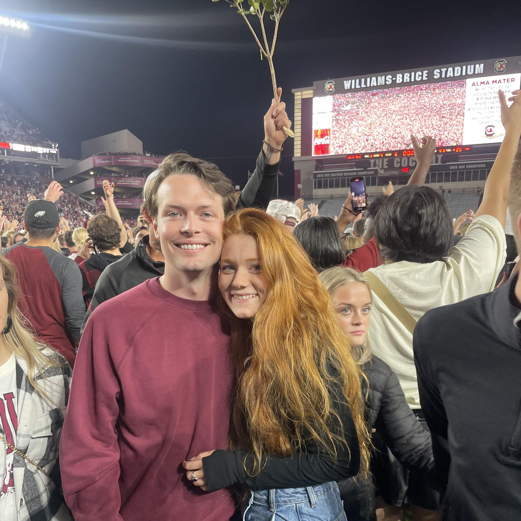 Dalton finally storming WillyB with me (last time I did it was when USC beat Tennessee and took them out of the playoffs -make sure to ask Dalton about it, it's one of his FAVORITE memories)