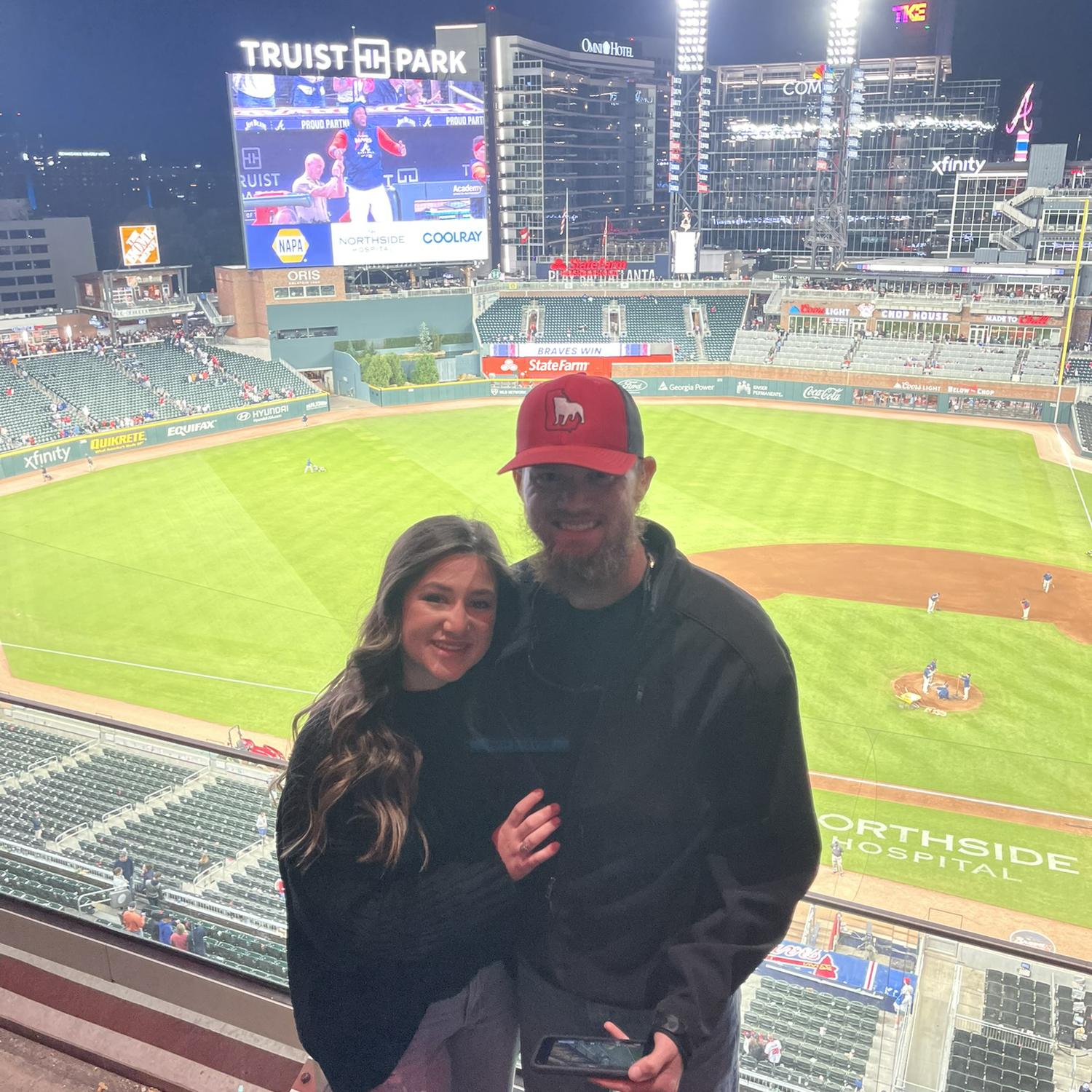 Alexis and Dlyen at their first Braves game in 2023