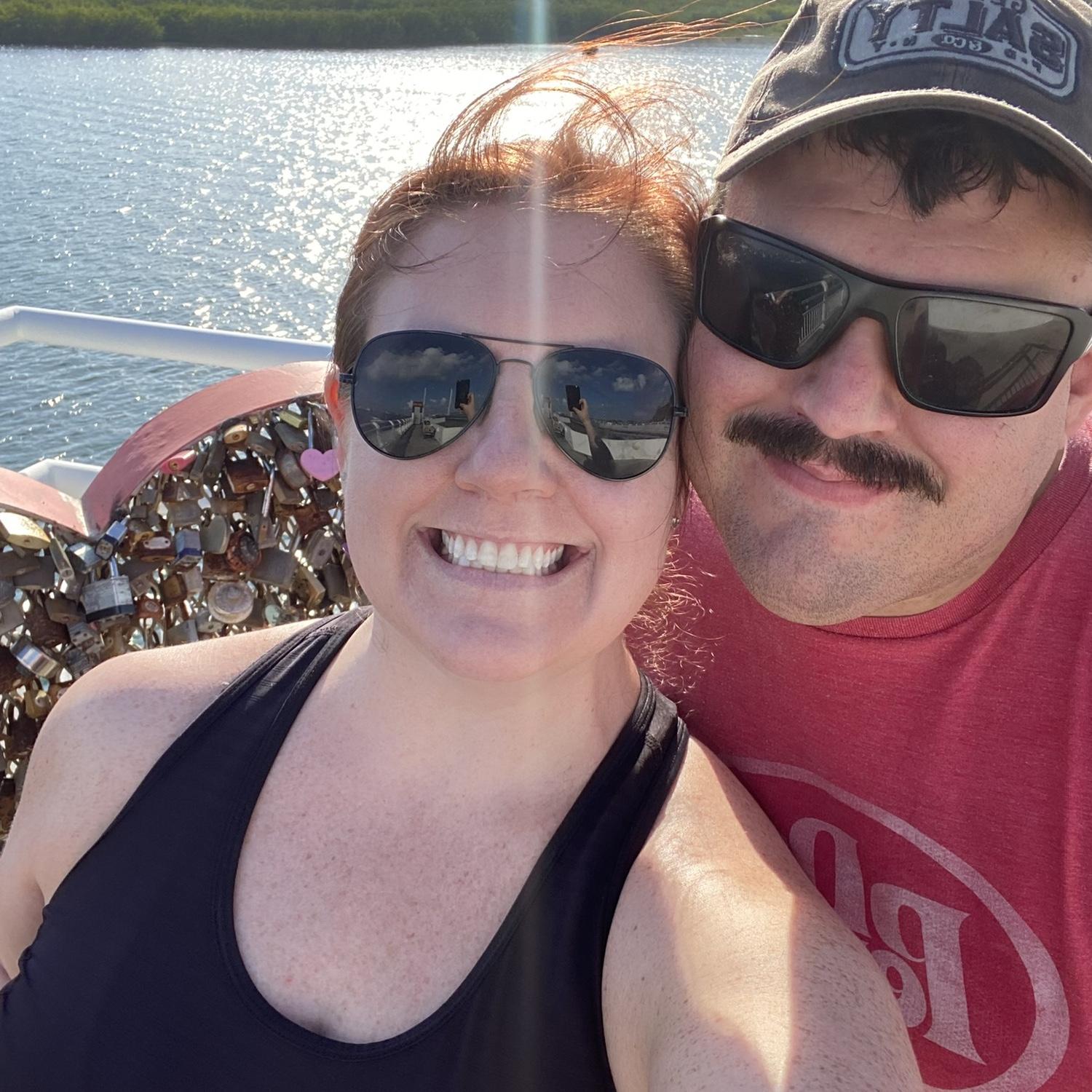 Adding our lock to the love lock causeway bridge in St. Martin
