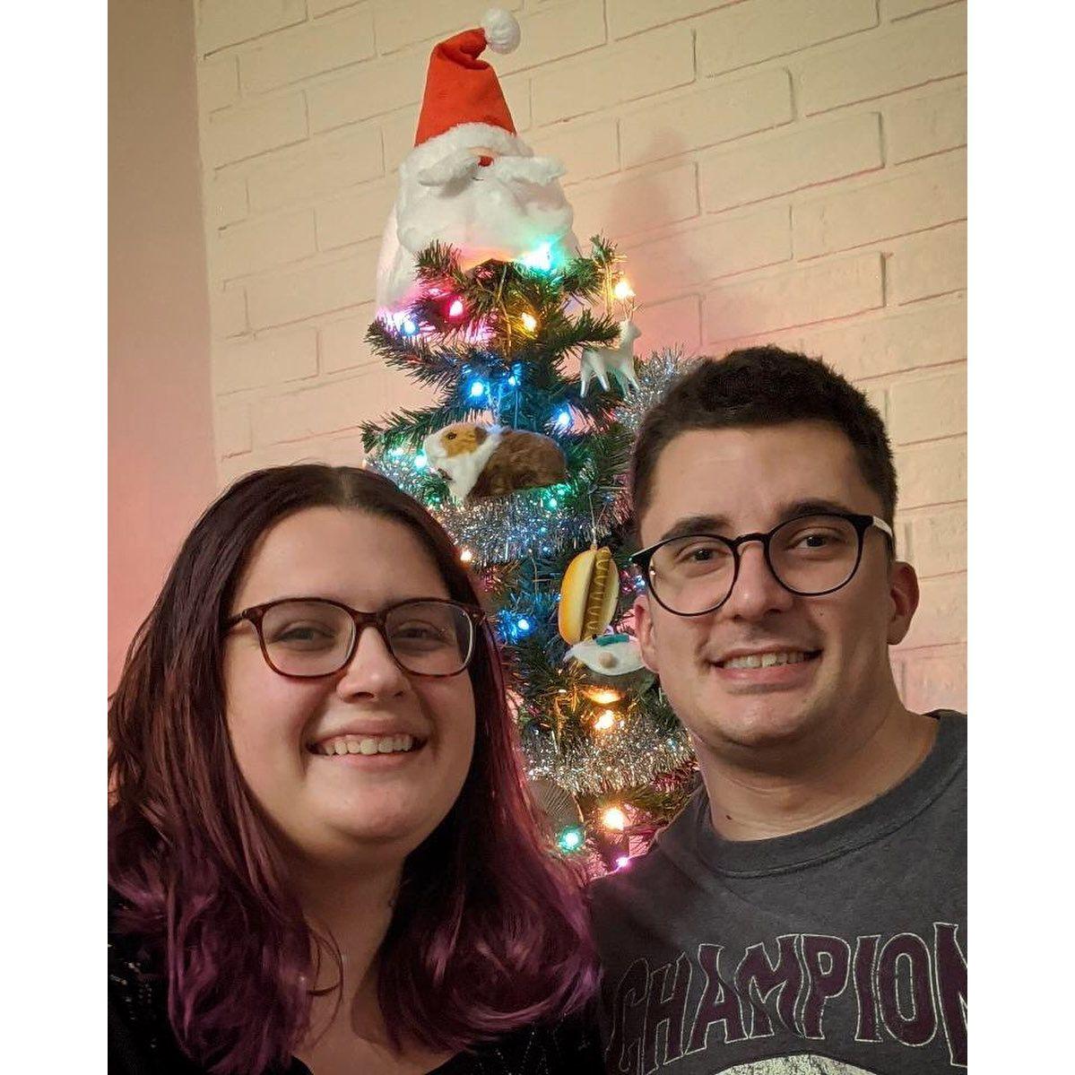 Our first Christmas together, with our tiny Christmas tree (Charlie).