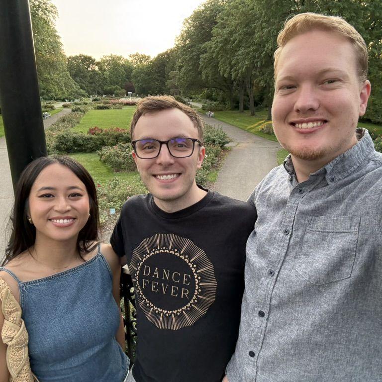 Us with Sean's maid-of-honor Rachael (2025).