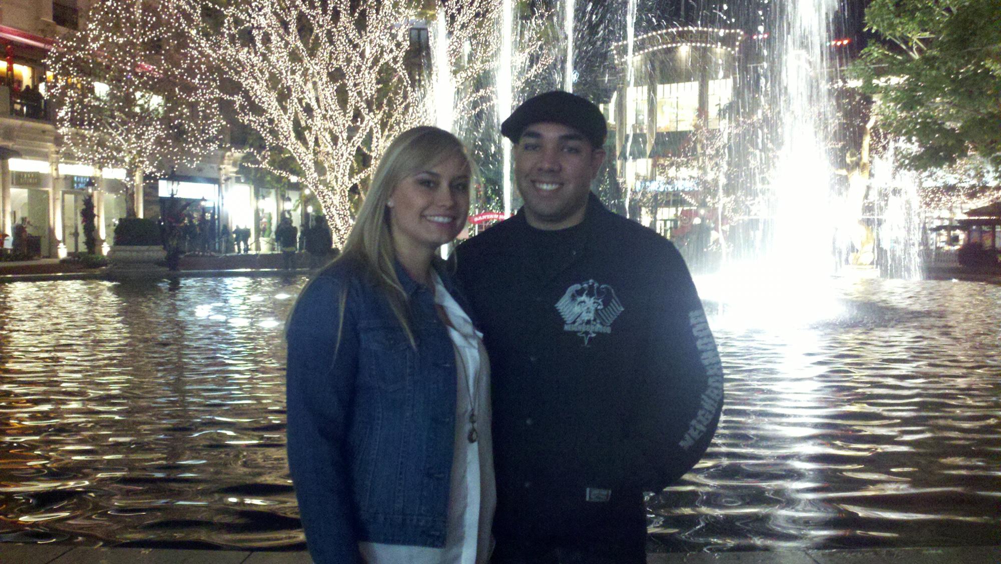 Couples stroll at the Americana on Brand in Glendale.