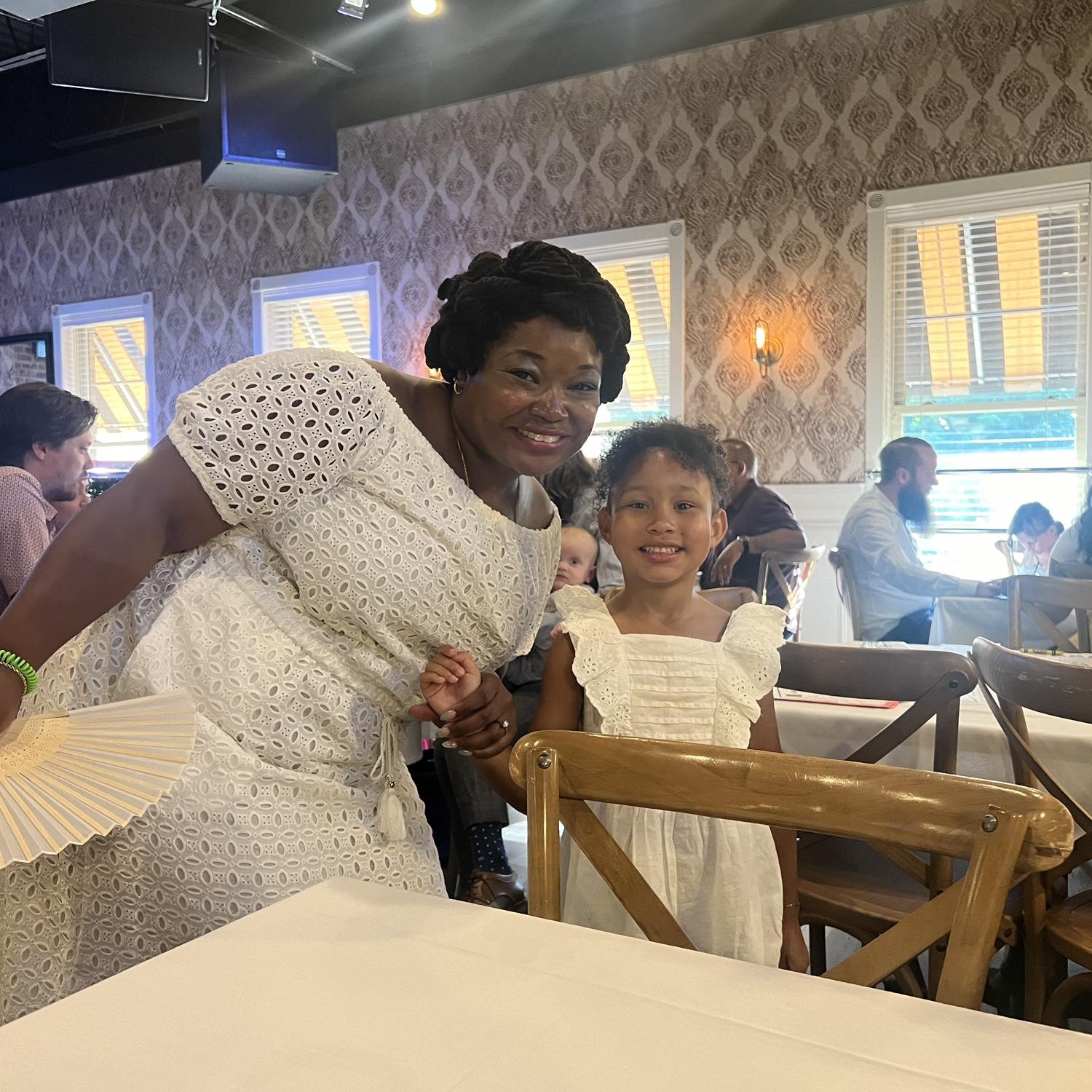 My niece wearing white at the engagement party. She’s a doll