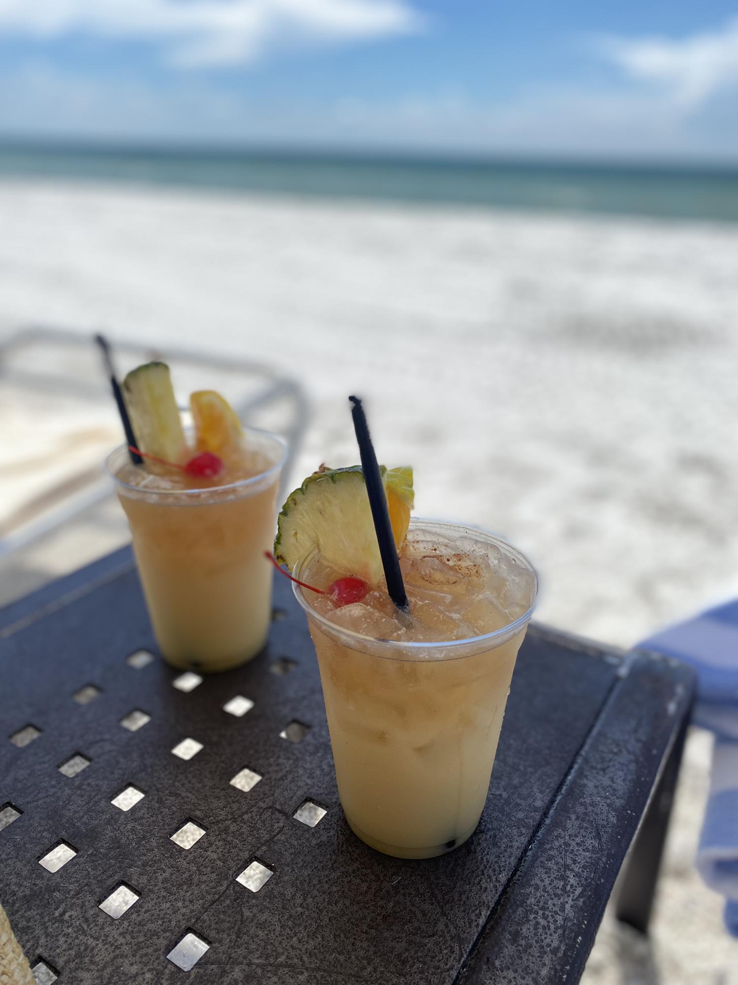 Cheers to the Marco Island Painkillers (rum drink) on the beach!