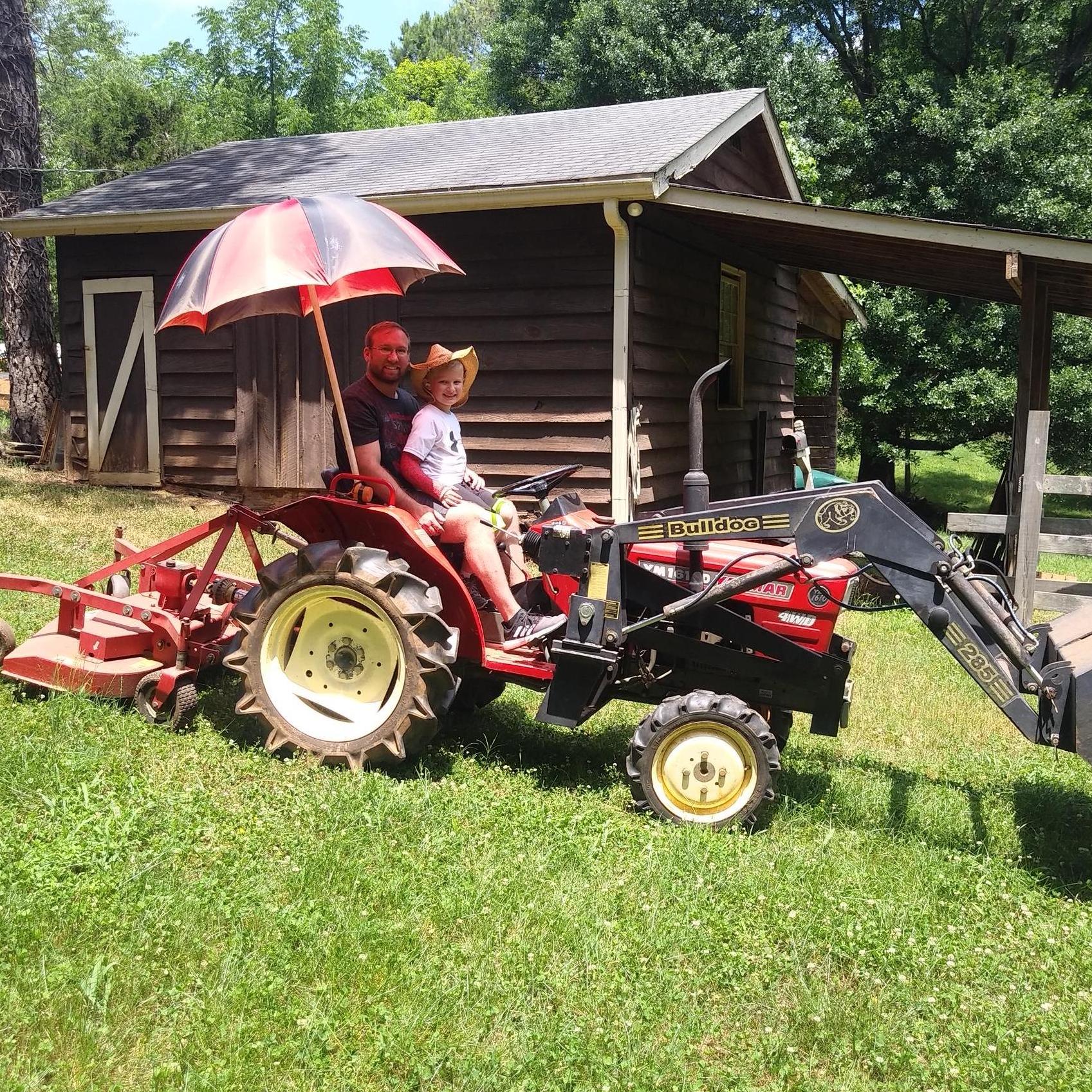 Riding on a tractor.