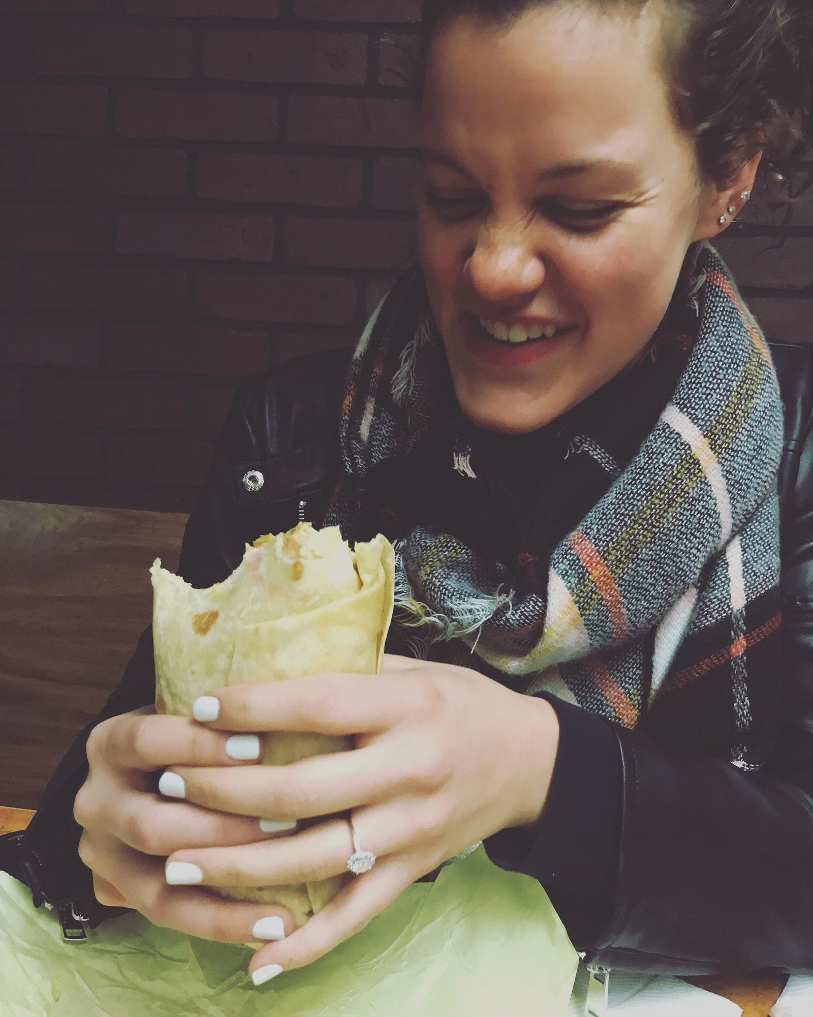 Faith eating a burrito days after the engagement. Trying not to get retried beans stuck in the ring!