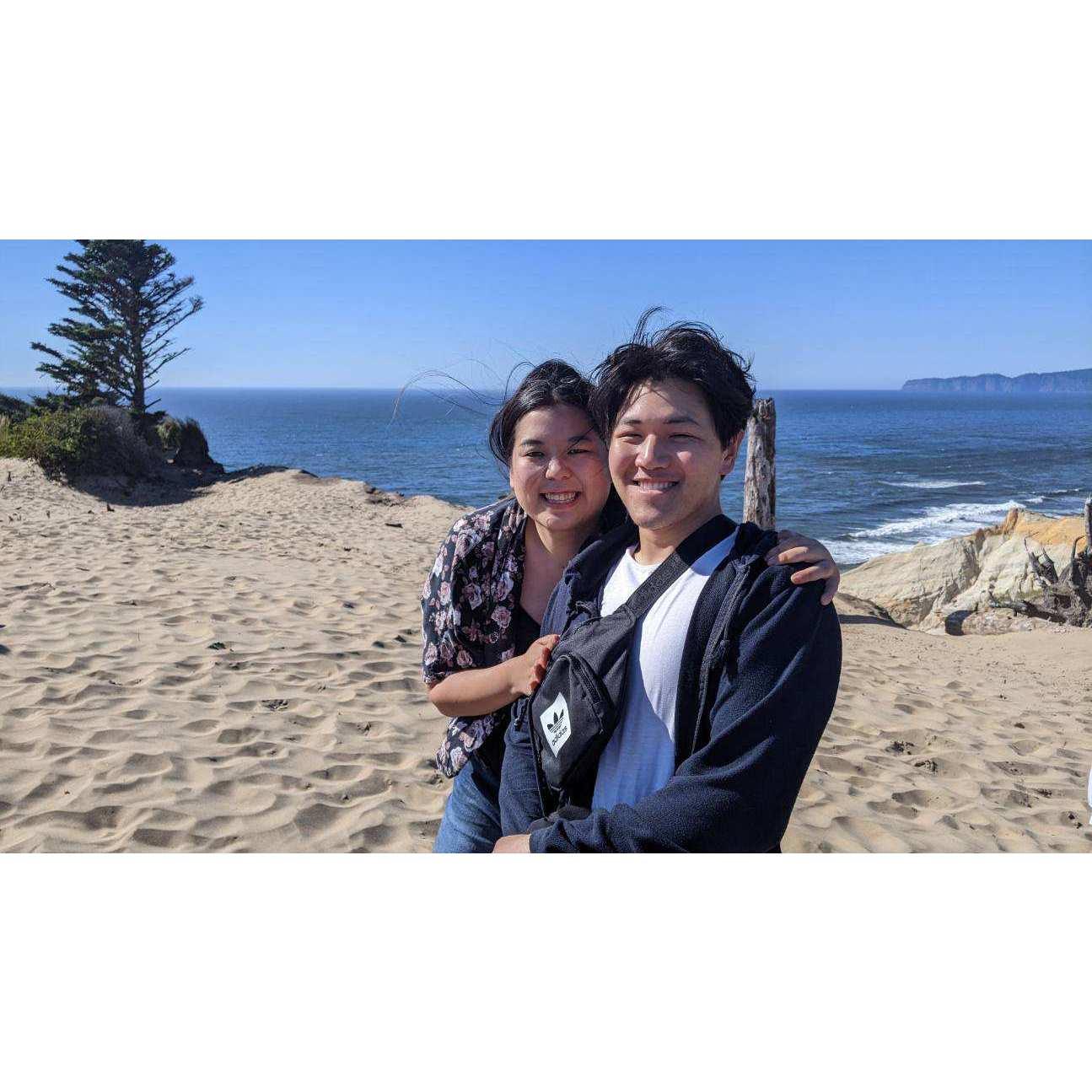 We hiked up the sand dunes when it was super windy and asked stranger to take a picture of us windy hair and all!