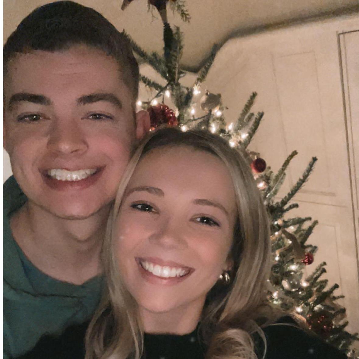 Decorating our first tree while living together in 2021!