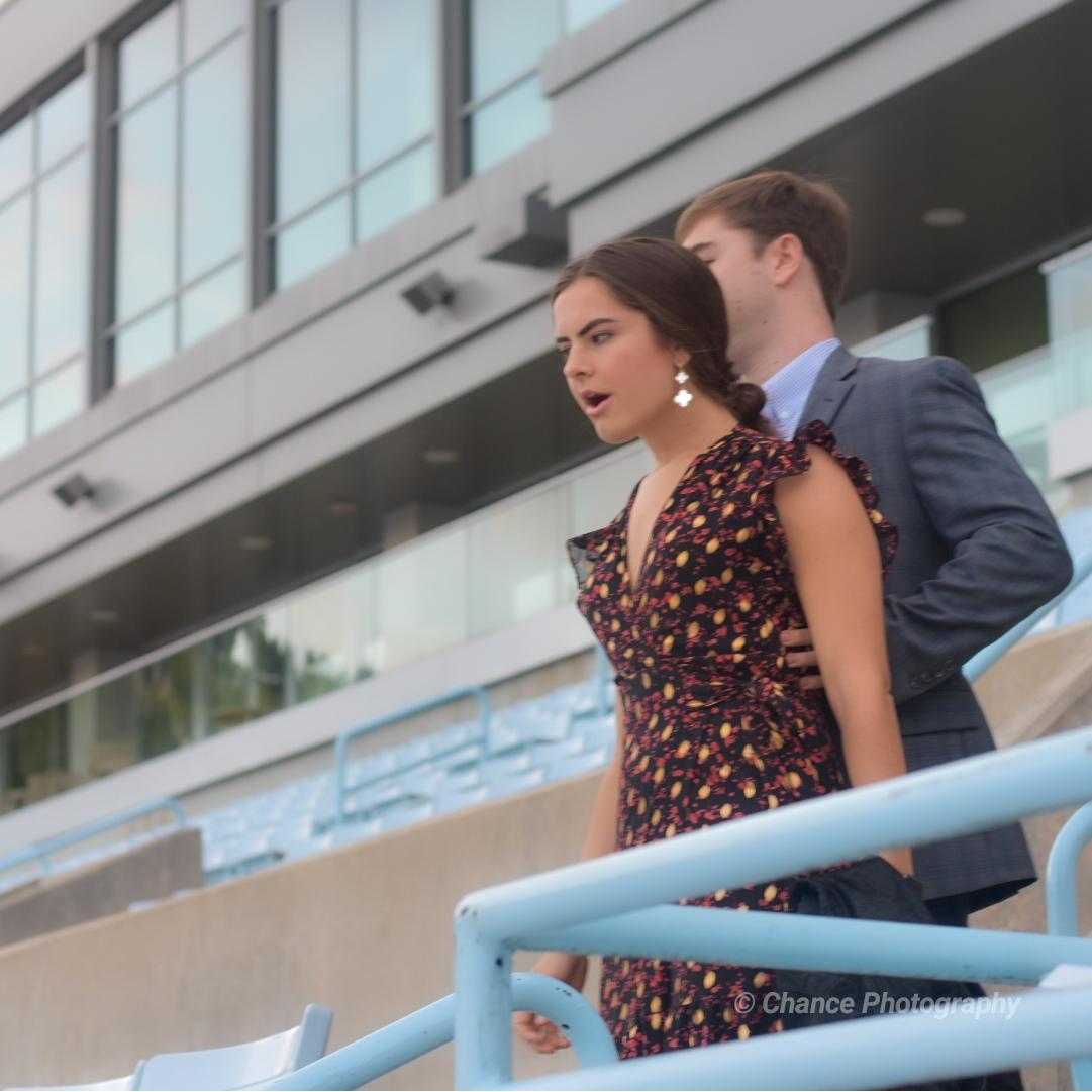 Coble told Becca they were going to a speaker event in the stadium, but instead popped the question...