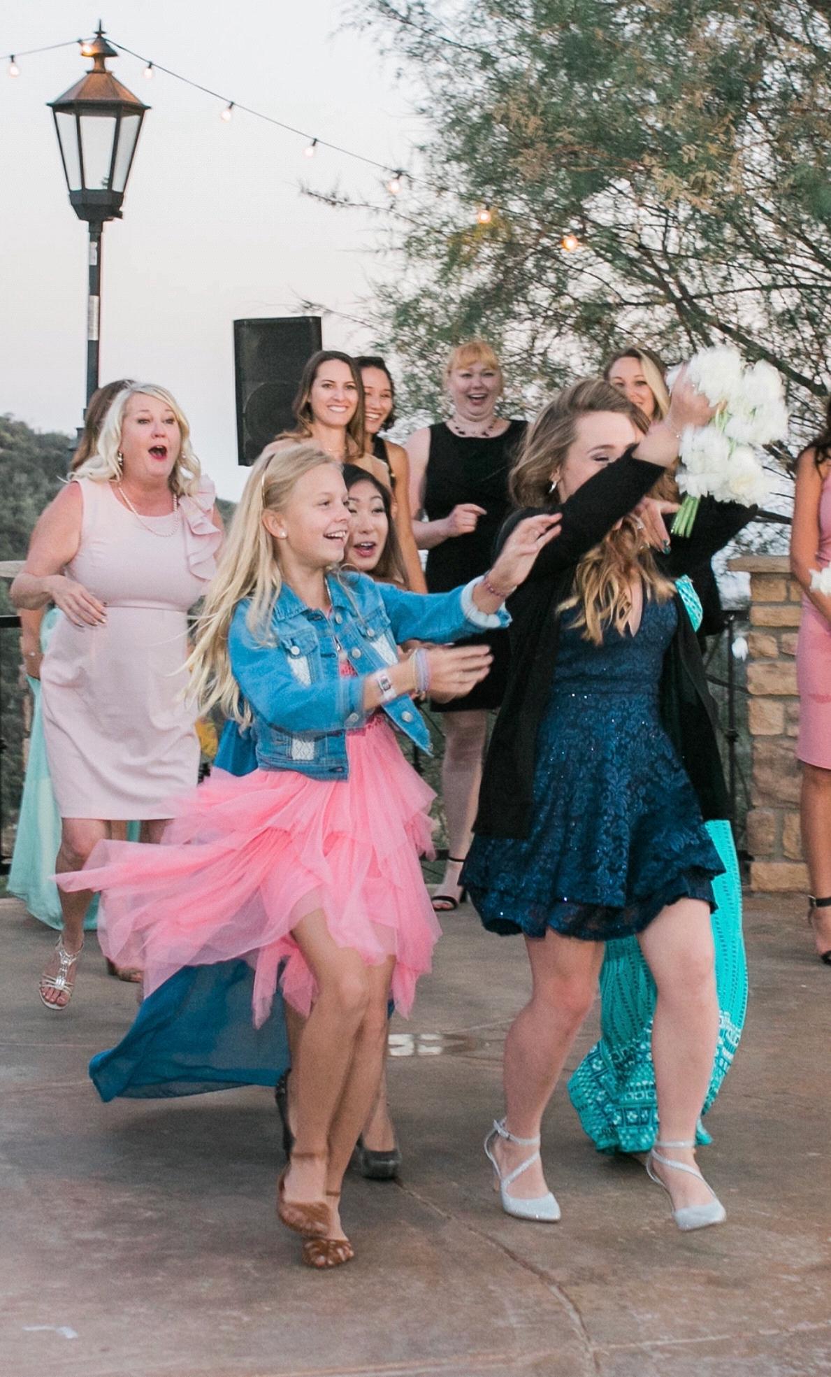 The first and last time Teryn caught a bouquet at a wedding. There’s no doubt about how bad she wanted to be next!