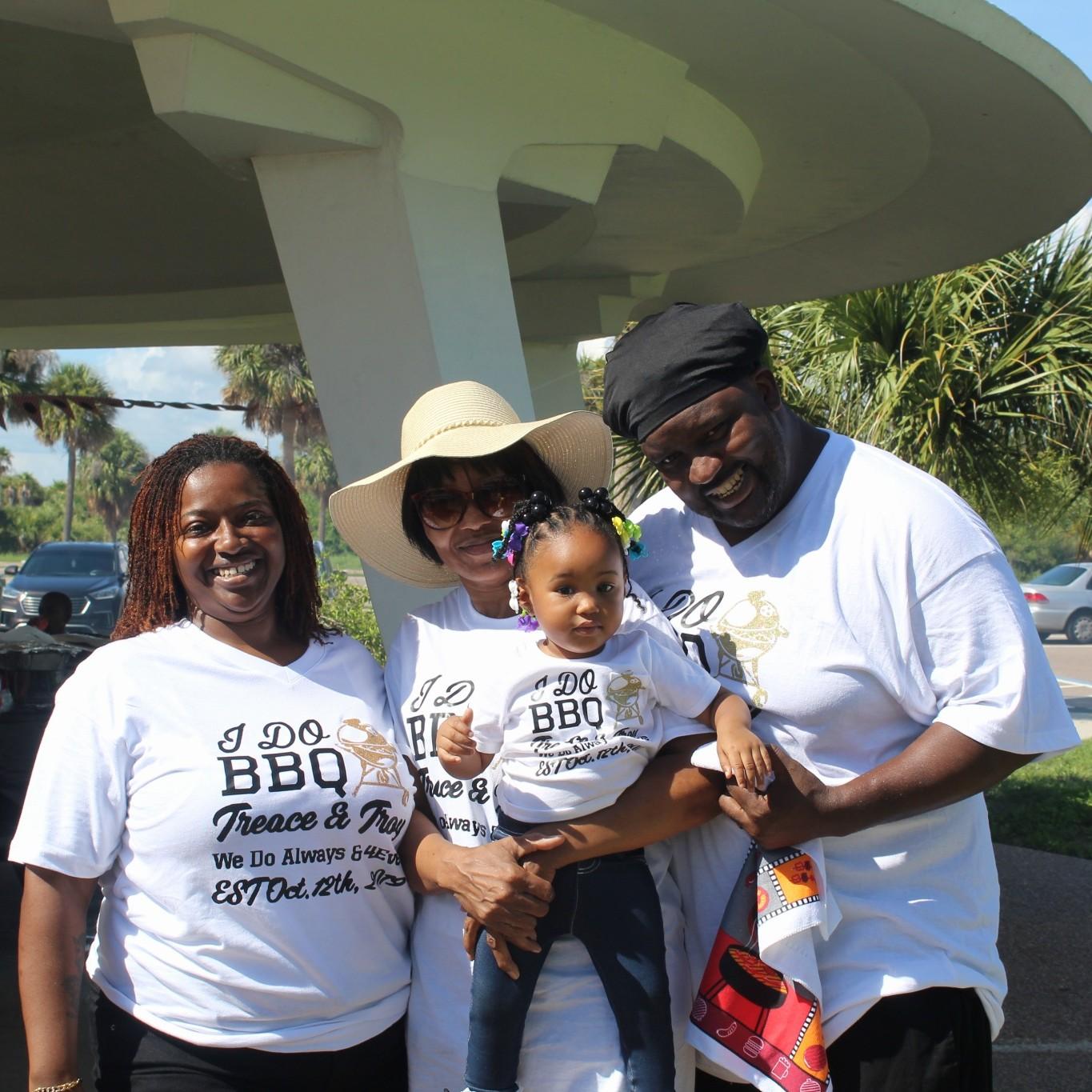 us at our I DO BBQ with our flower girl and Our Coordinator
