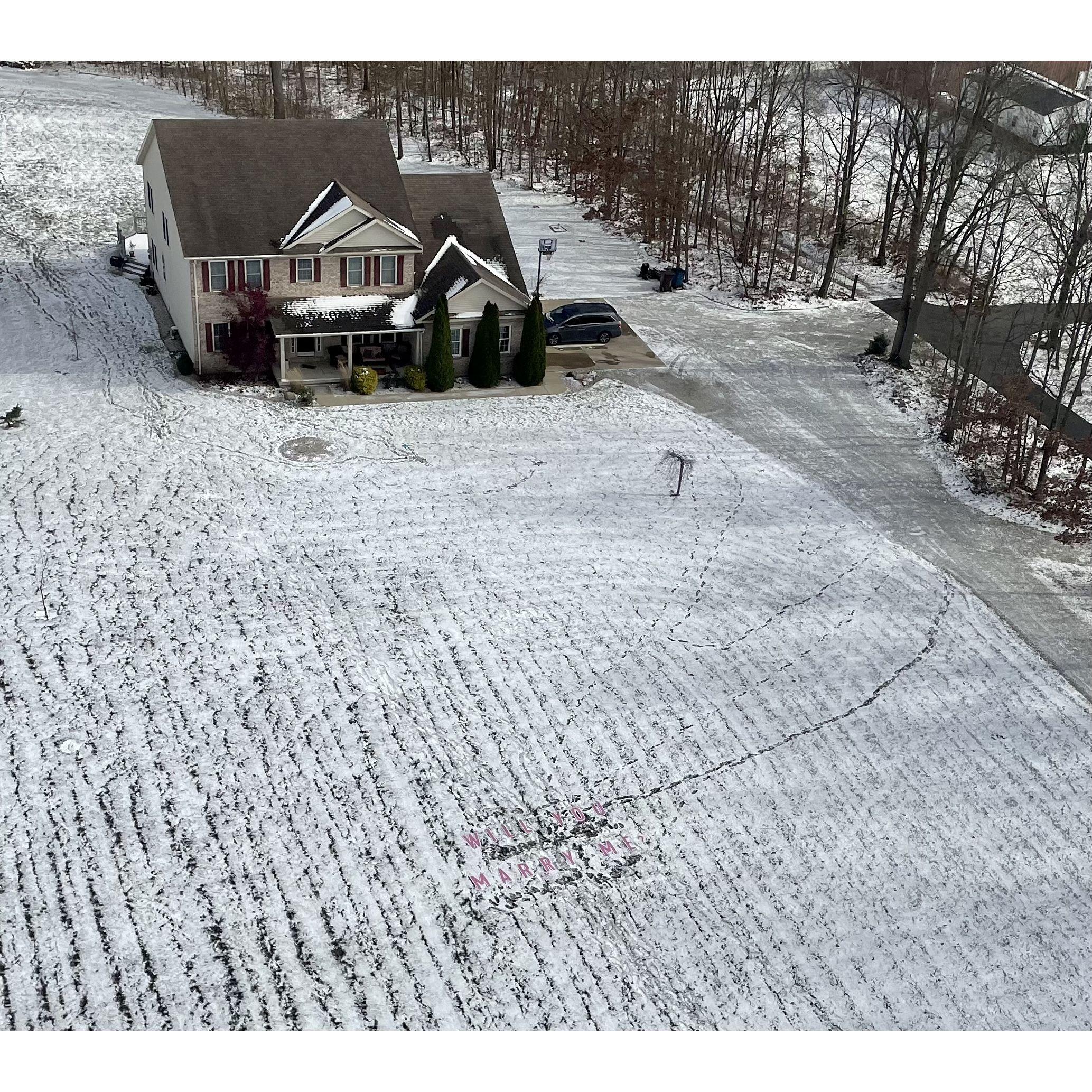 Flying over Seth's house with the words "Will your marry me?" on the ground!