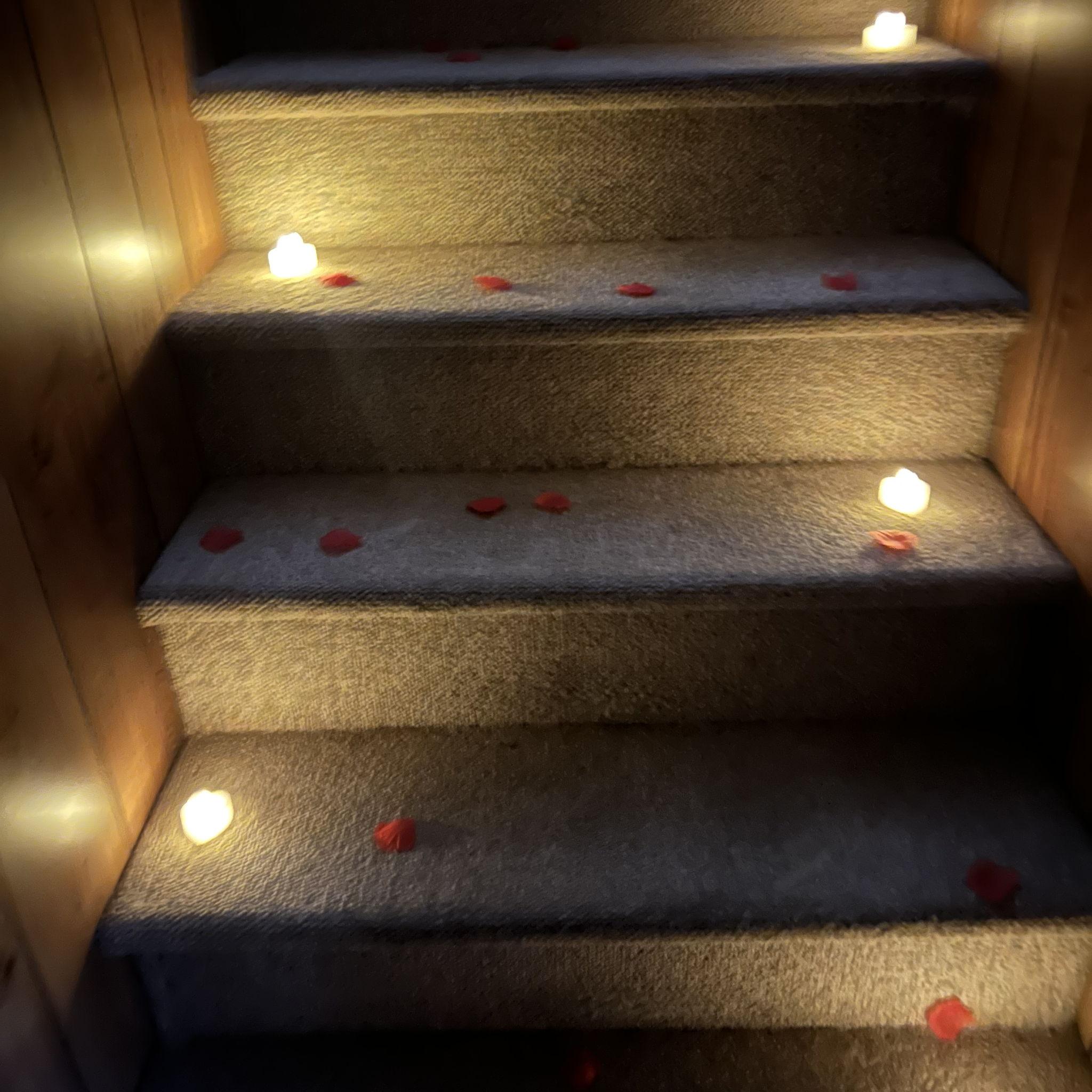 Lights and rose petals, excellent touch!