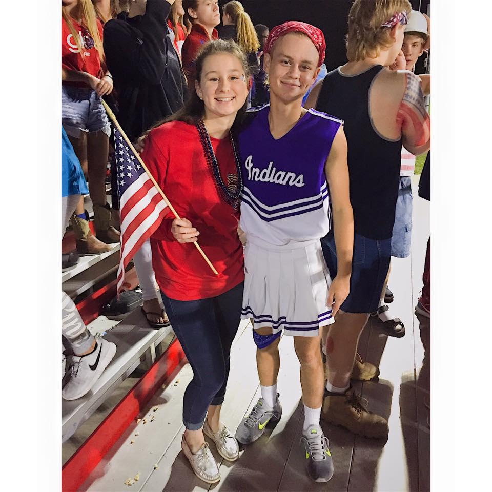 We will always remember this picture. Harrison dressed up as a cheerleader for a high school football game.