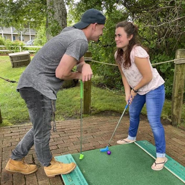 Random picture my sister snuck of us flirting when we were supposed to be mini golfing. Oops! 😁