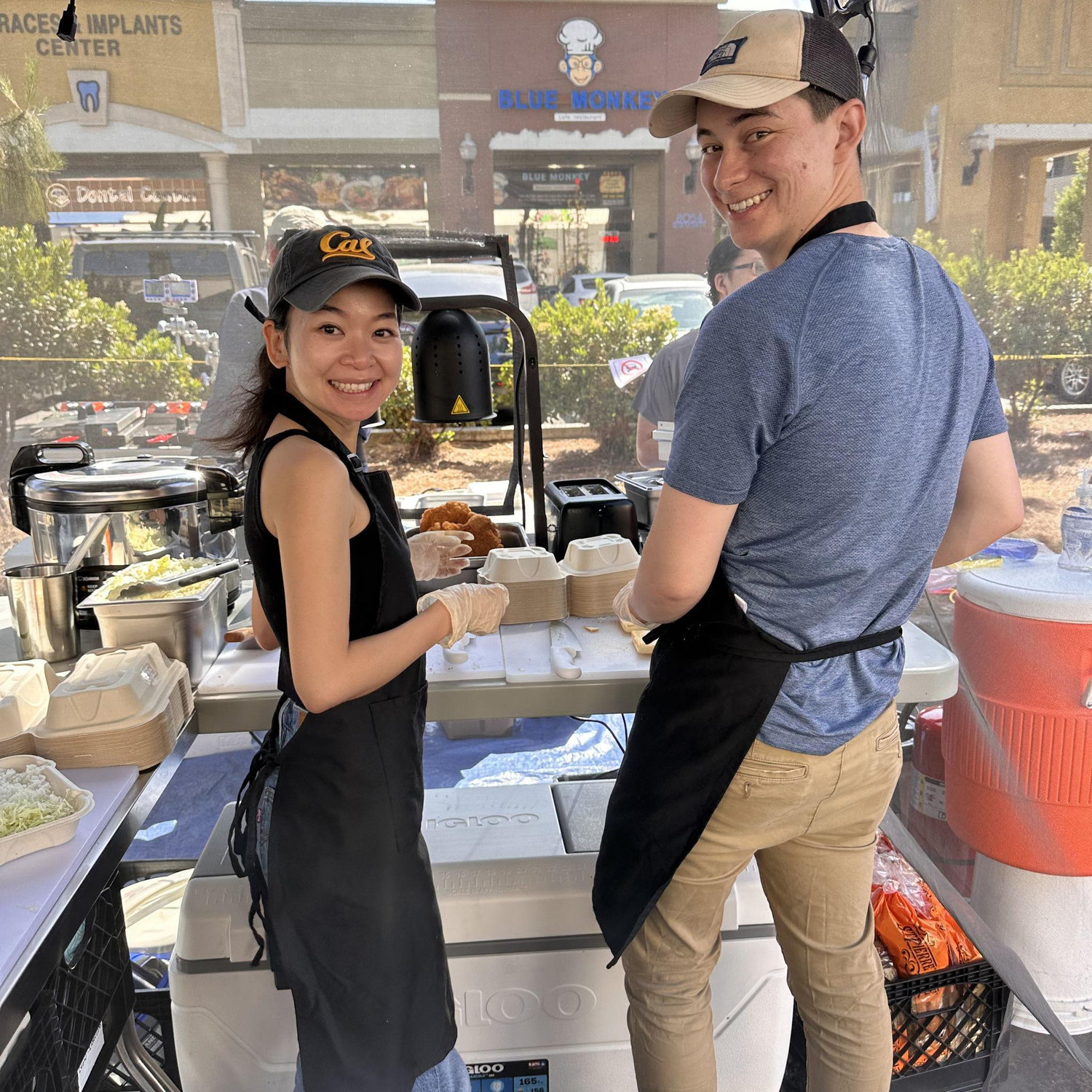 Picture of Kingpin Katsu's #1 employee and the guy who doesn't pay her